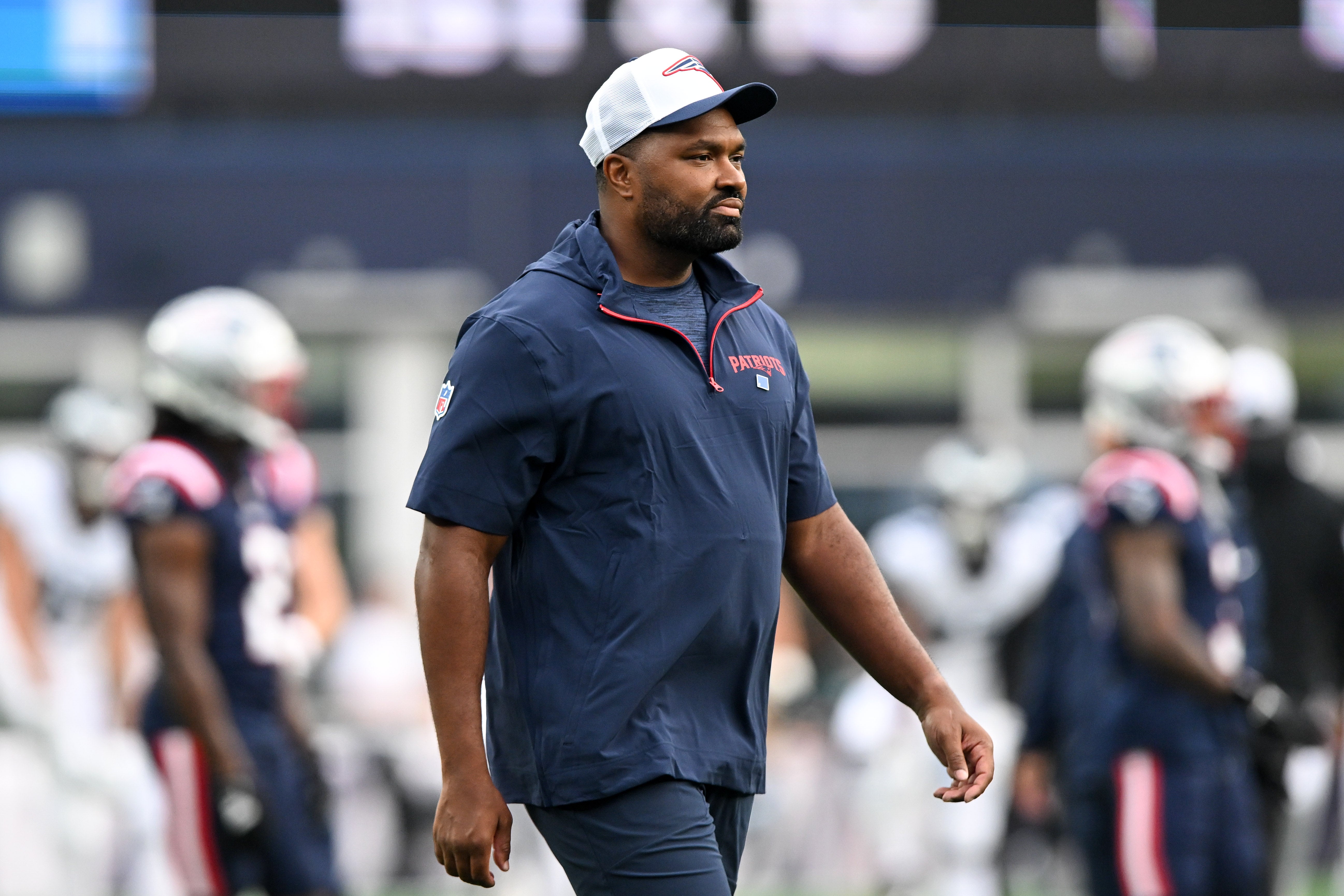 Aug 15, 2024; Foxborough, Massachusetts, USA; New England Patriots head coach Jerod Mayo walks onto the field before a game against the Philadelphia Eagles at Gillette Stadium.