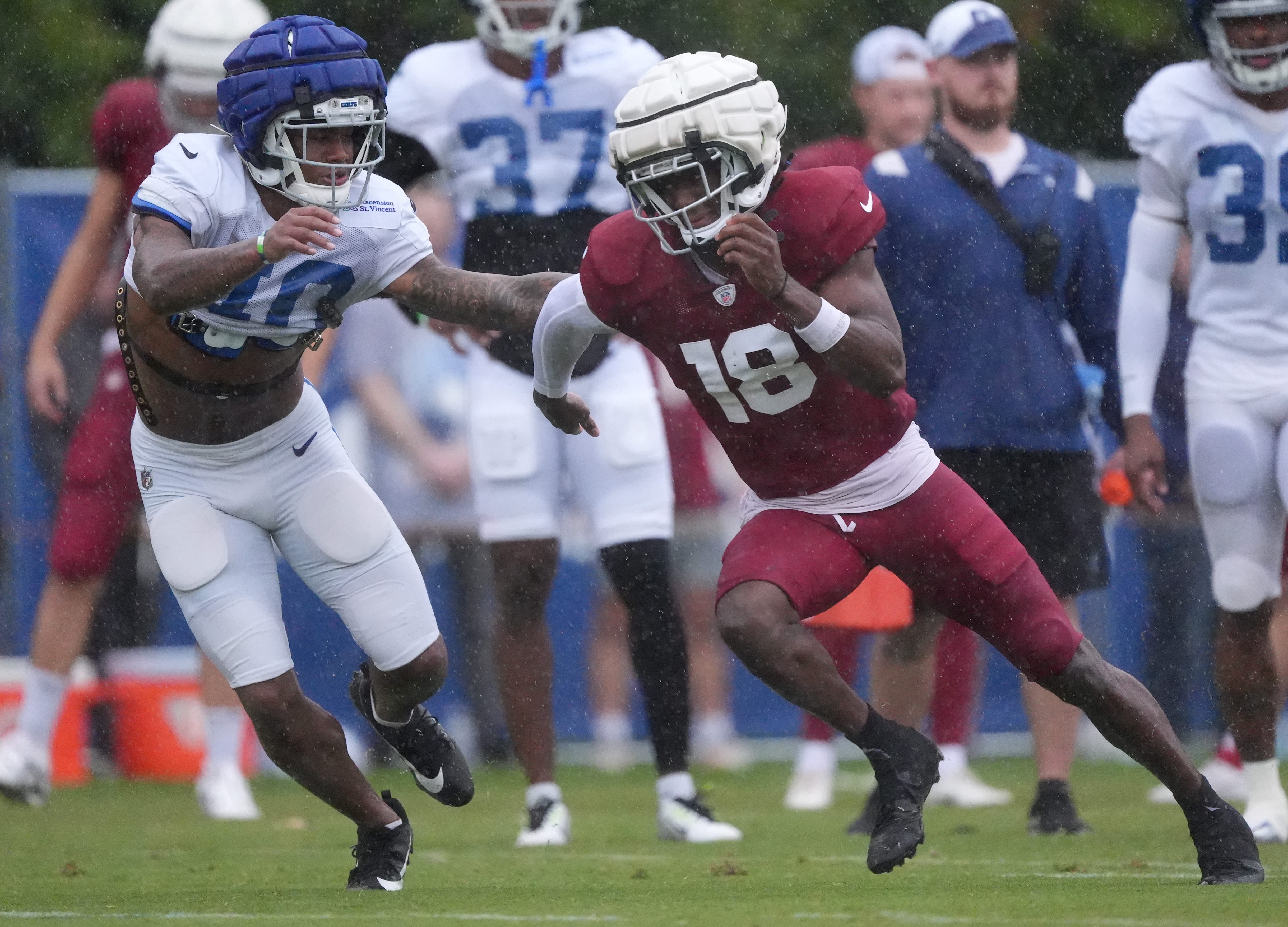 Indianapolis Colts wide receiver Adonai Mitchell (10) guards Arizona Cardinals wide receiver Marvin Harrison Jr. (18) during a joint practice on Thursday, Aug. 15, 2024, at Grand Park Sports Complex in Westfield.