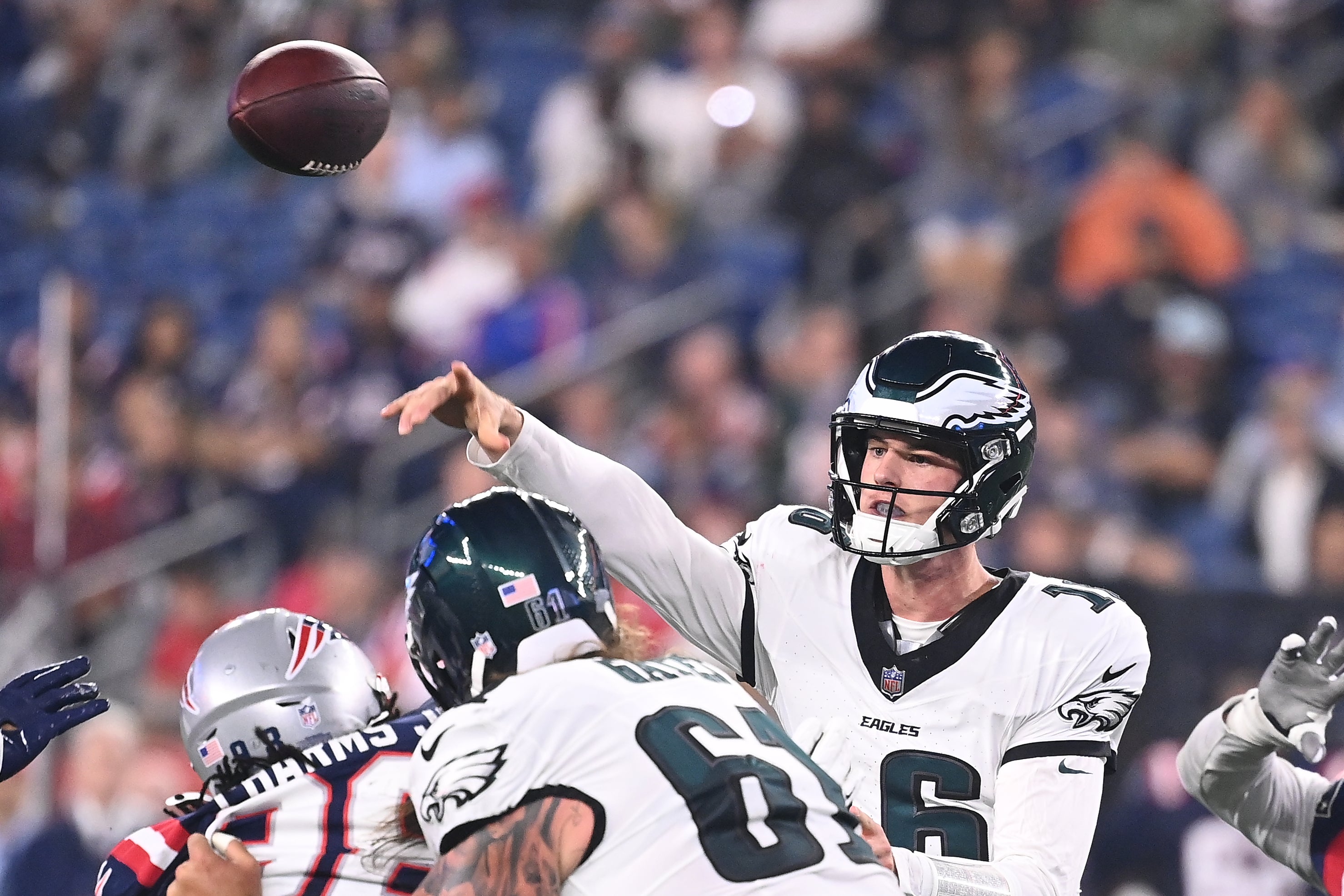 Philadelphia Eagles quarterback Tanner McKee (16) throws a pass against the New England Patriots during the second half at Gillette Stadium.