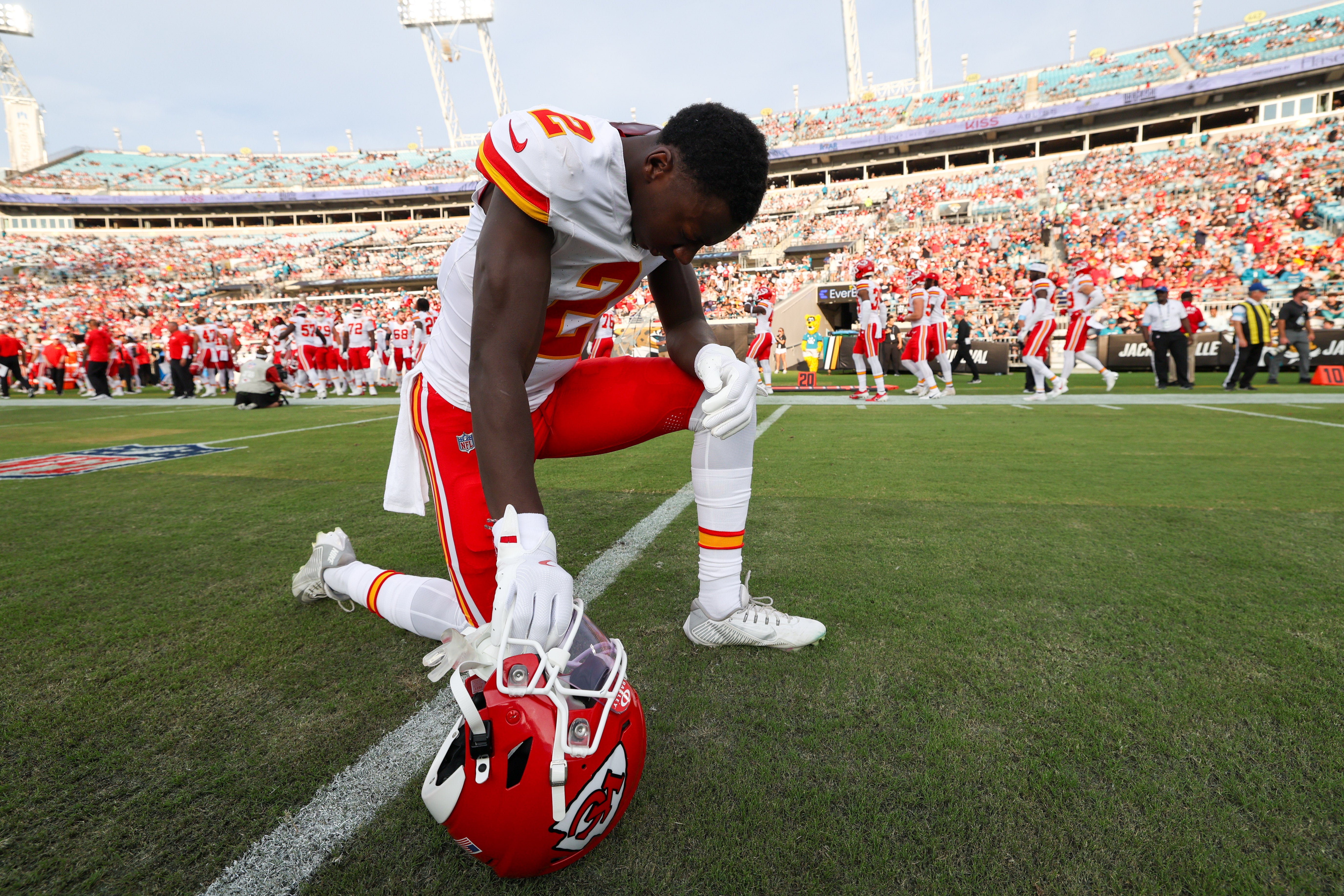 Aug 10, 2024; Jacksonville, Florida, USA;Kansas City Chiefs cornerback Joshua Williams (2) kneels before a preseason game against the Jacksonville Jaguars at EverBank Stadium.