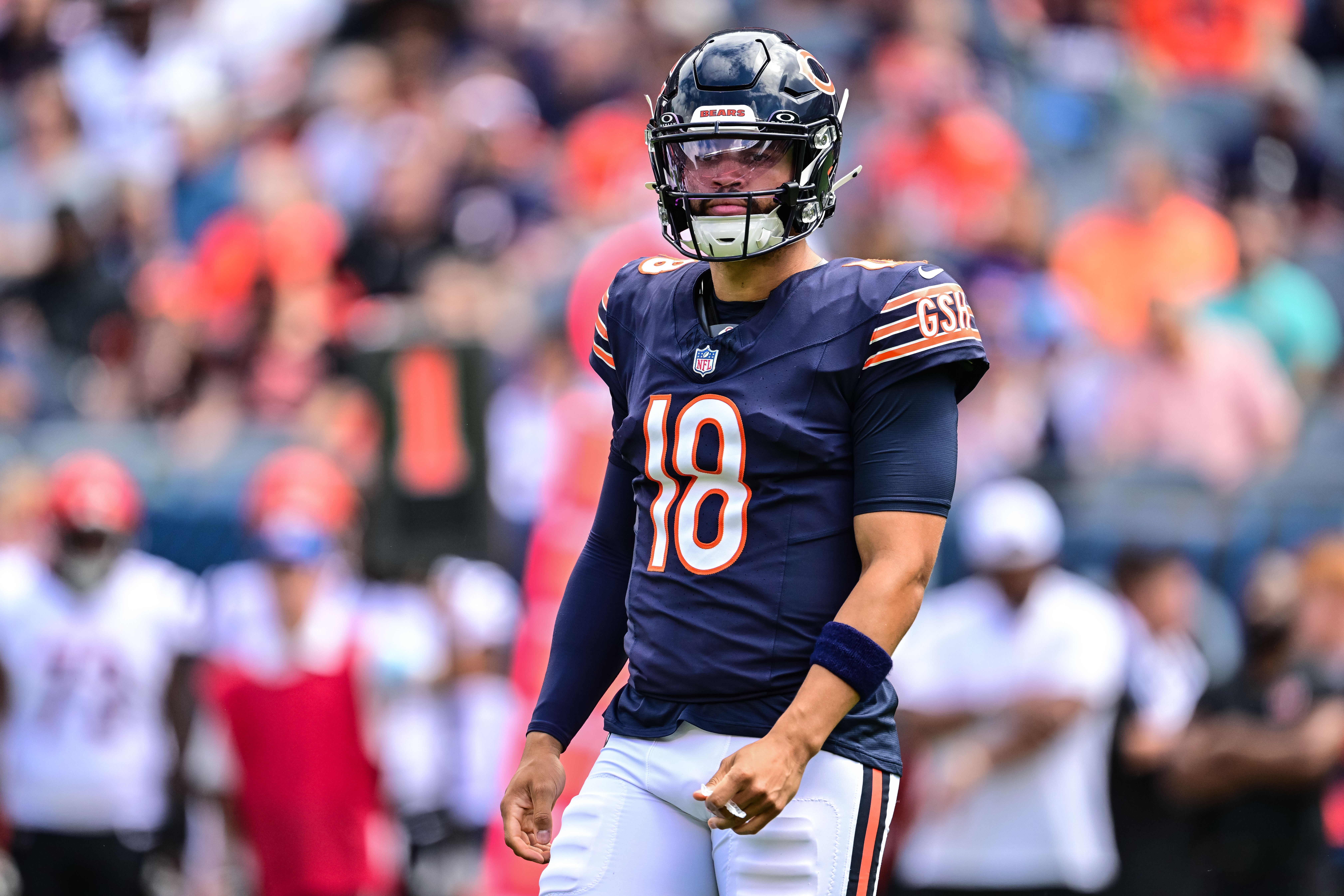 Aug 17, 2024; Chicago, Illinois, USA; Chicago Bears quarterback Caleb Williams (18) looks on against the Cincinnati Bengals during the first quarter at Soldier Field.