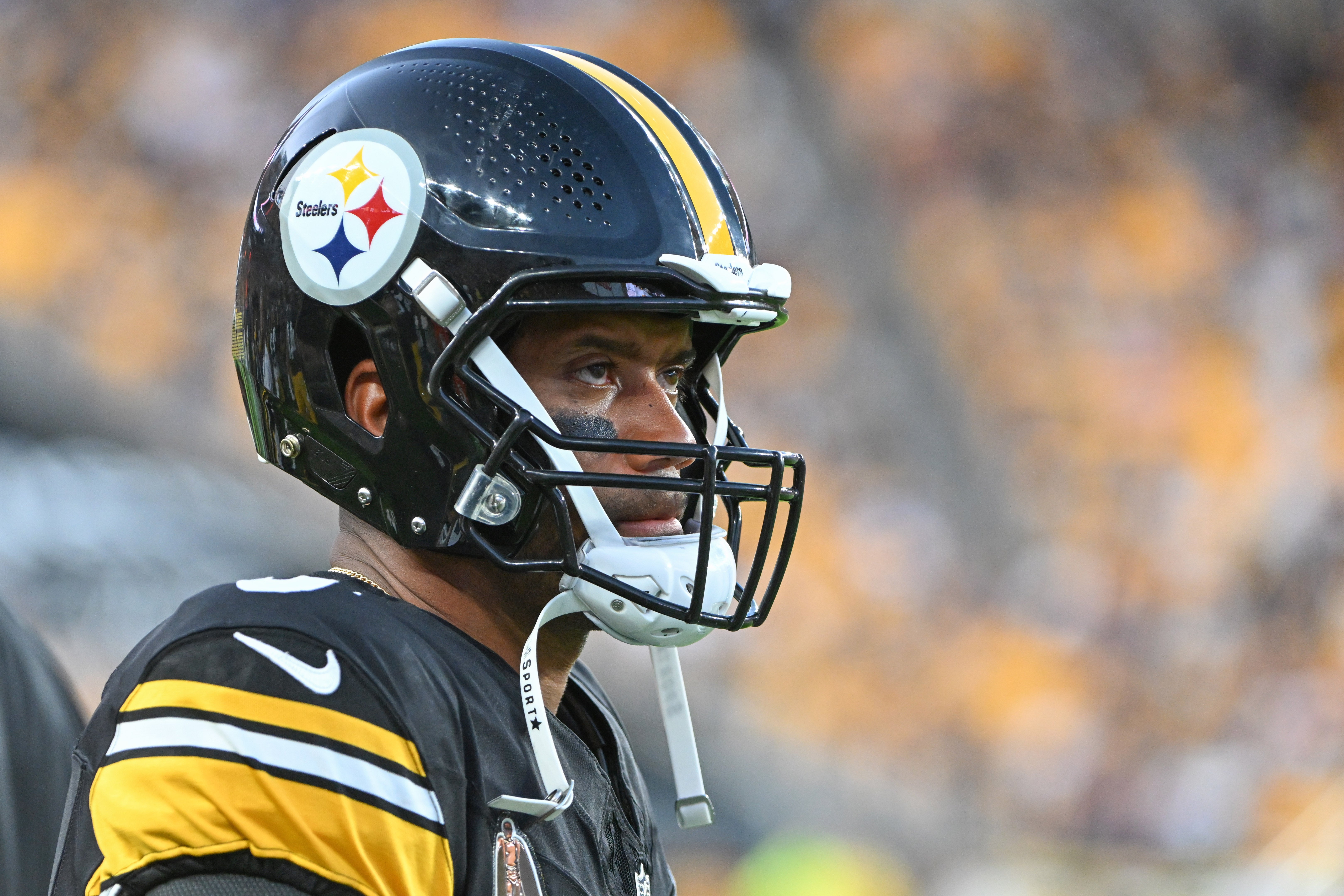 Aug 9, 2024; Pittsburgh, Pennsylvania, USA; Pittsburgh Steelers quarterback Russell Wilson (3) watches the action against the Houston Texans during the 2nd quarter at Acrisure Stadium. Mandatory Credit: Barry Reeger-USA TODAY Sports