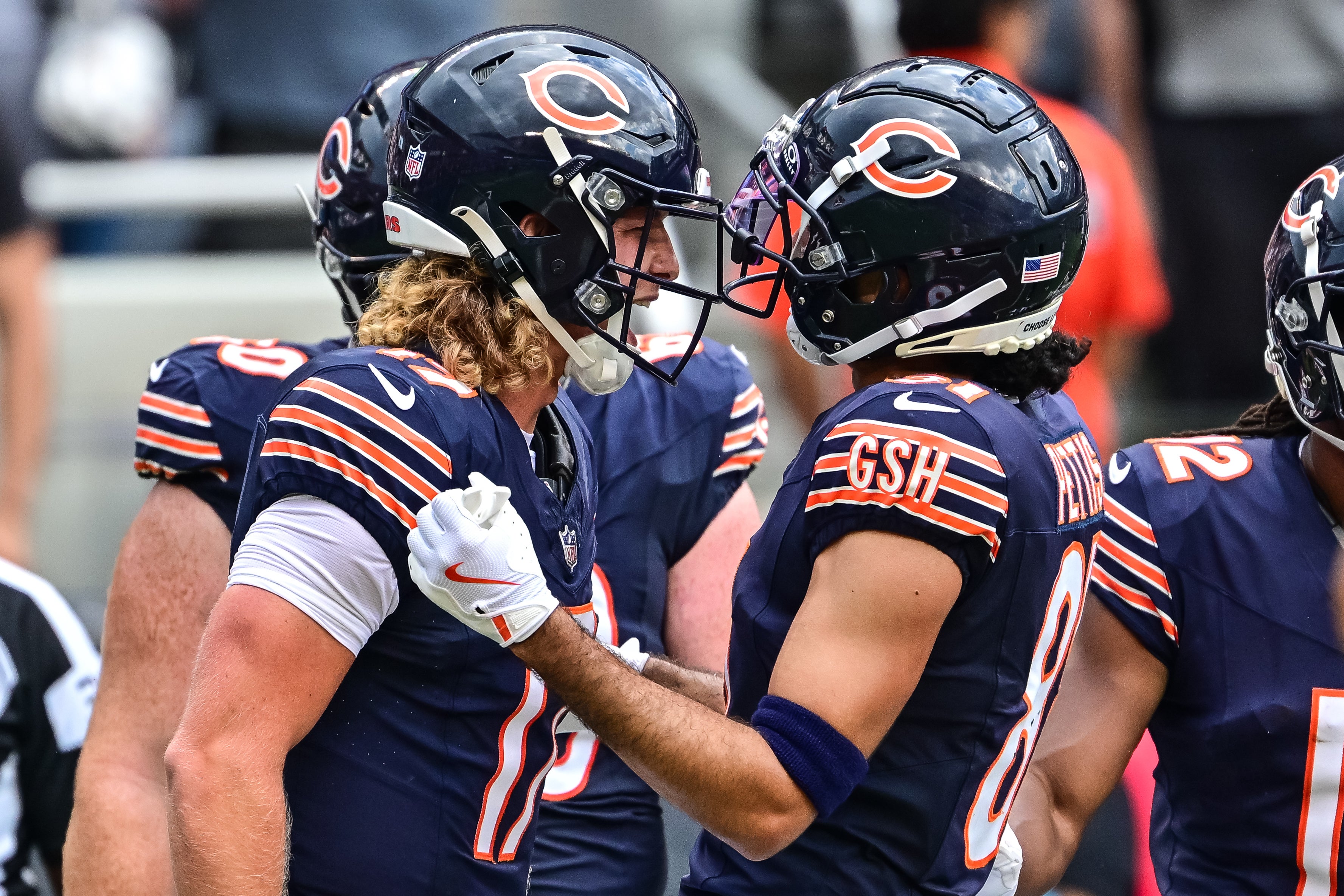 Aug 17, 2024; Chicago, Illinois, USA; Chicago Bears quarterback Tyson Bagent (17) celebrates his touchdown pass and catch by wide receiver Dante Pettis (81) against the Cincinnati Bengals during the third quarter at Soldier Field.