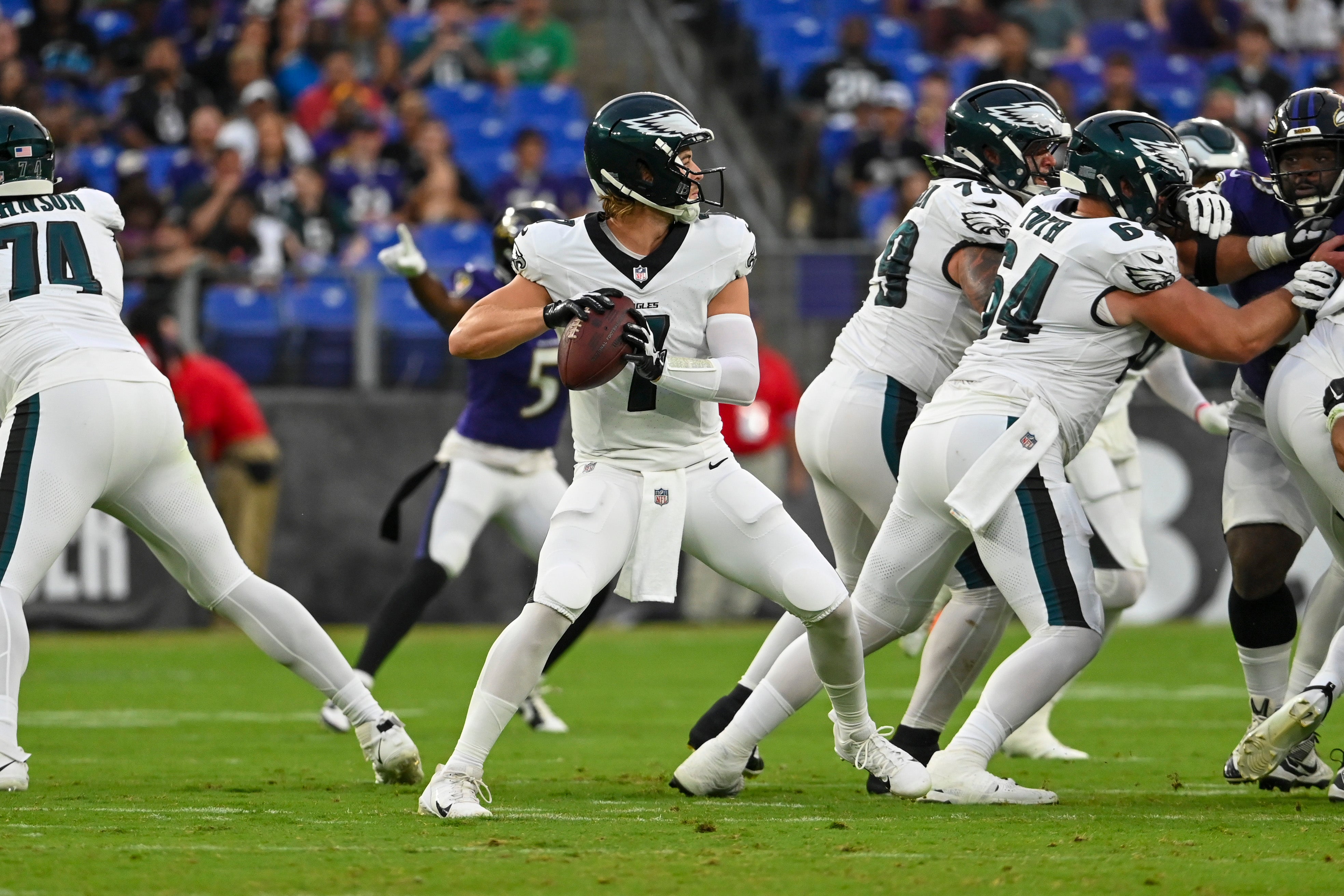 Philadelphia Eagles quarterback Kenny Pickett (7) looks to pass from the pocket during the first quarter of a preseason game against the Baltimore Ravens at M&T Bank Stadium.