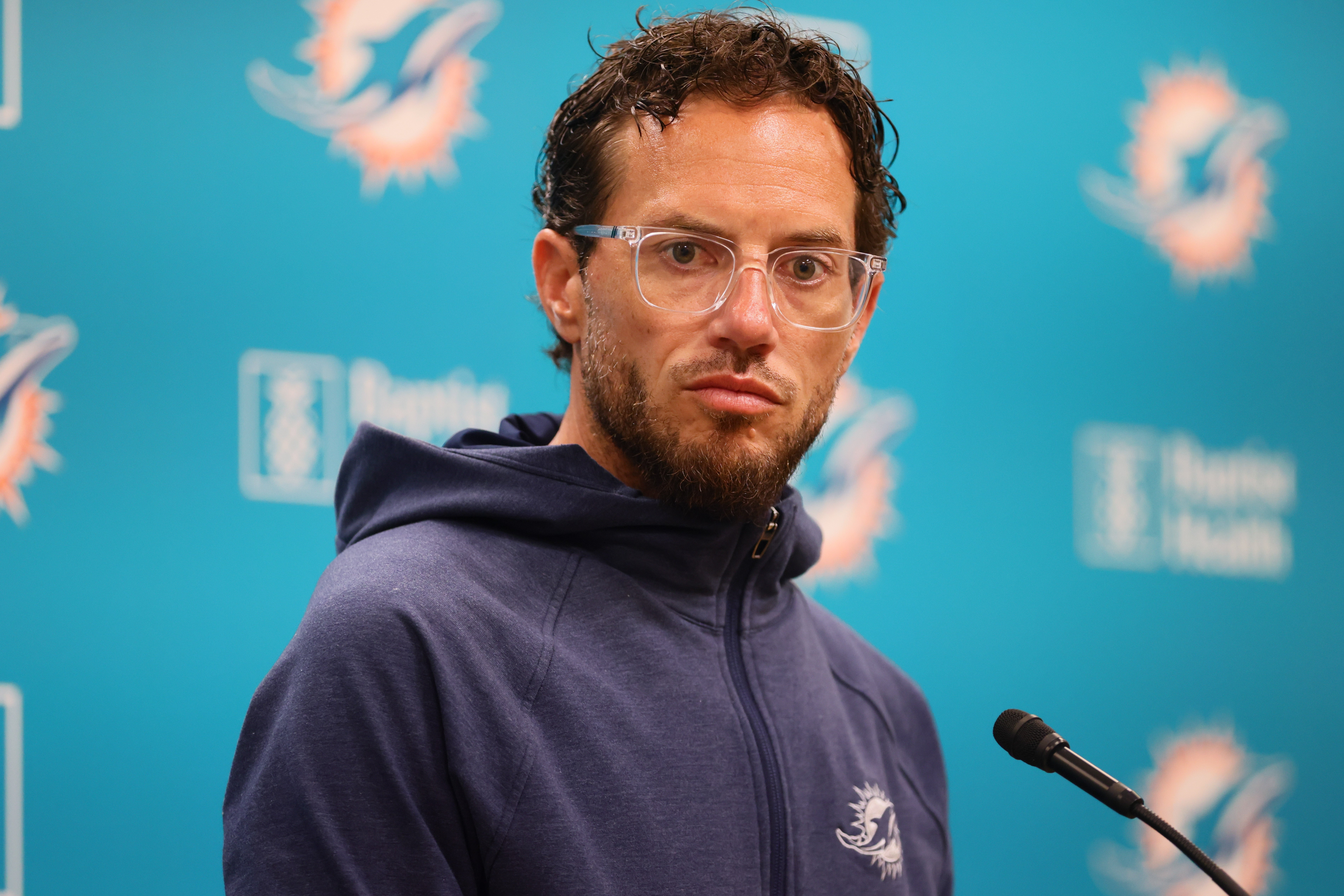 Aug 15, 2024; Miami Gardens, FL, USA; Miami Dolphins head coach Mike McDaniel talks to reporters before joint practice with the Washington Commanders at Baptist Health Training Complex.