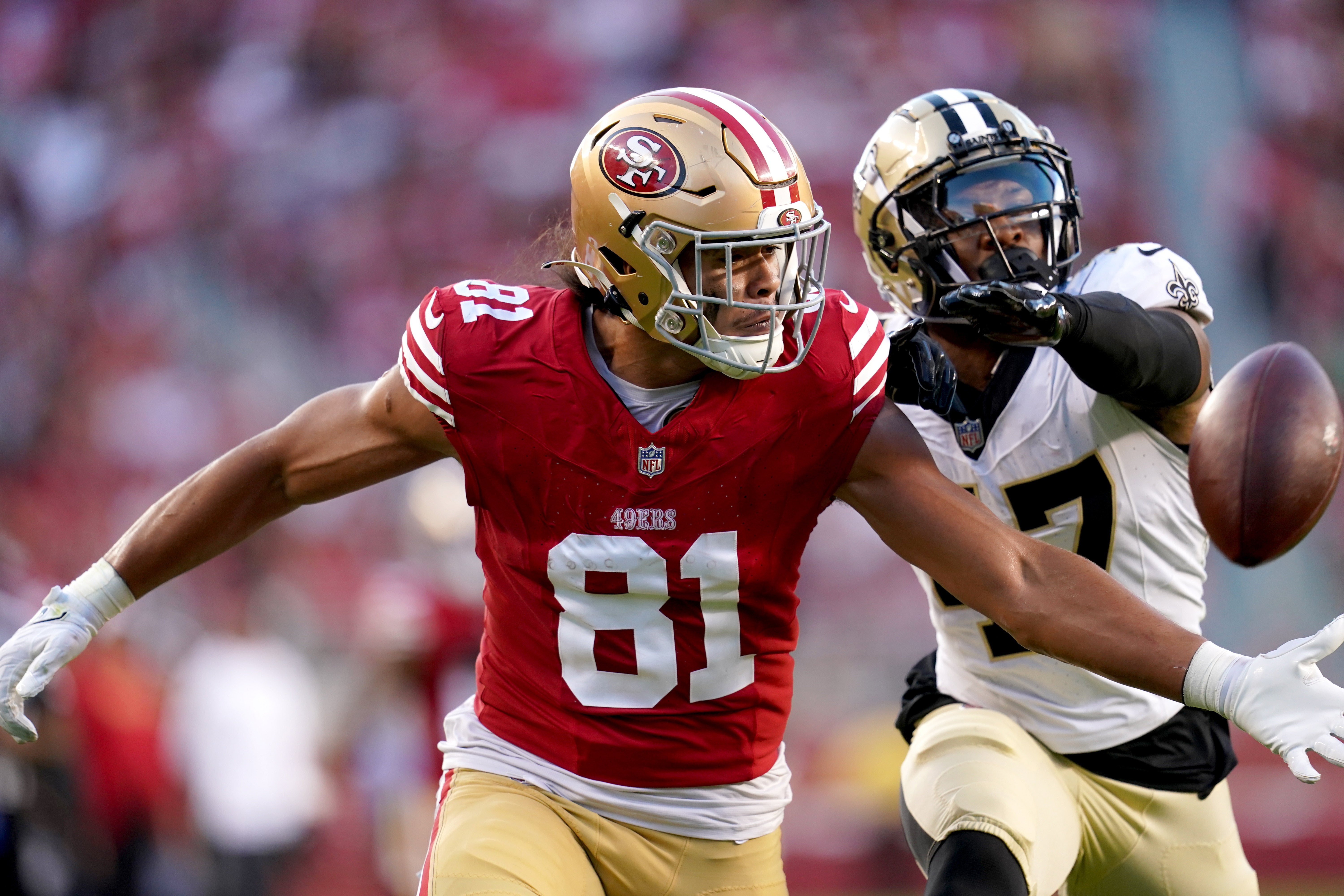 Aug 18, 2024; Santa Clara, California, USA; San Francisco 49ers tight end Cameron Latu (81) is unable to catch a pass in front of San Francisco 49ers linebacker Ezekiel Turner (47) in the third quarter at Levi's Stadium.