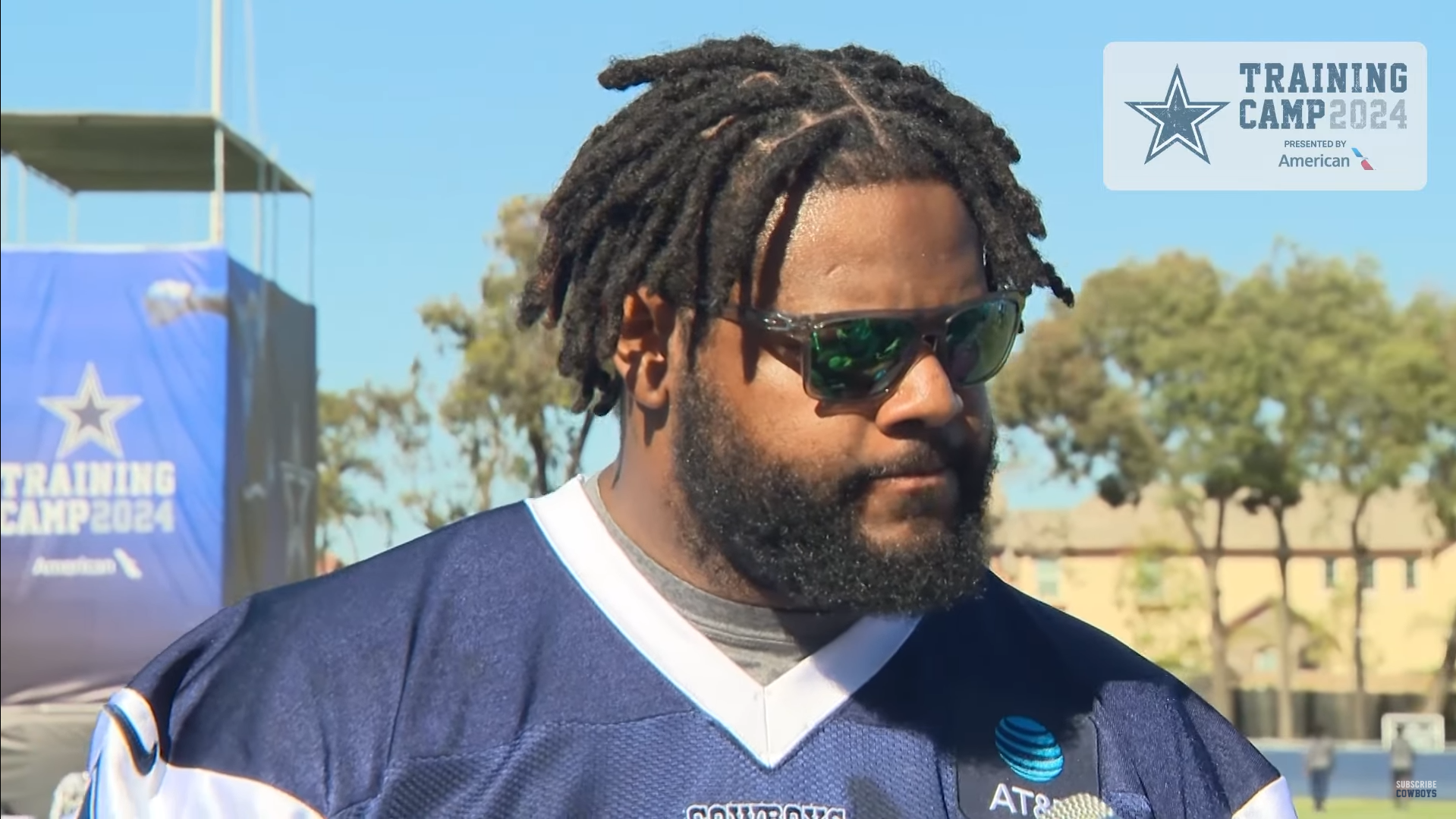 Dallas Cowboys DT Jordan Phillips talks to reporters at training camp.