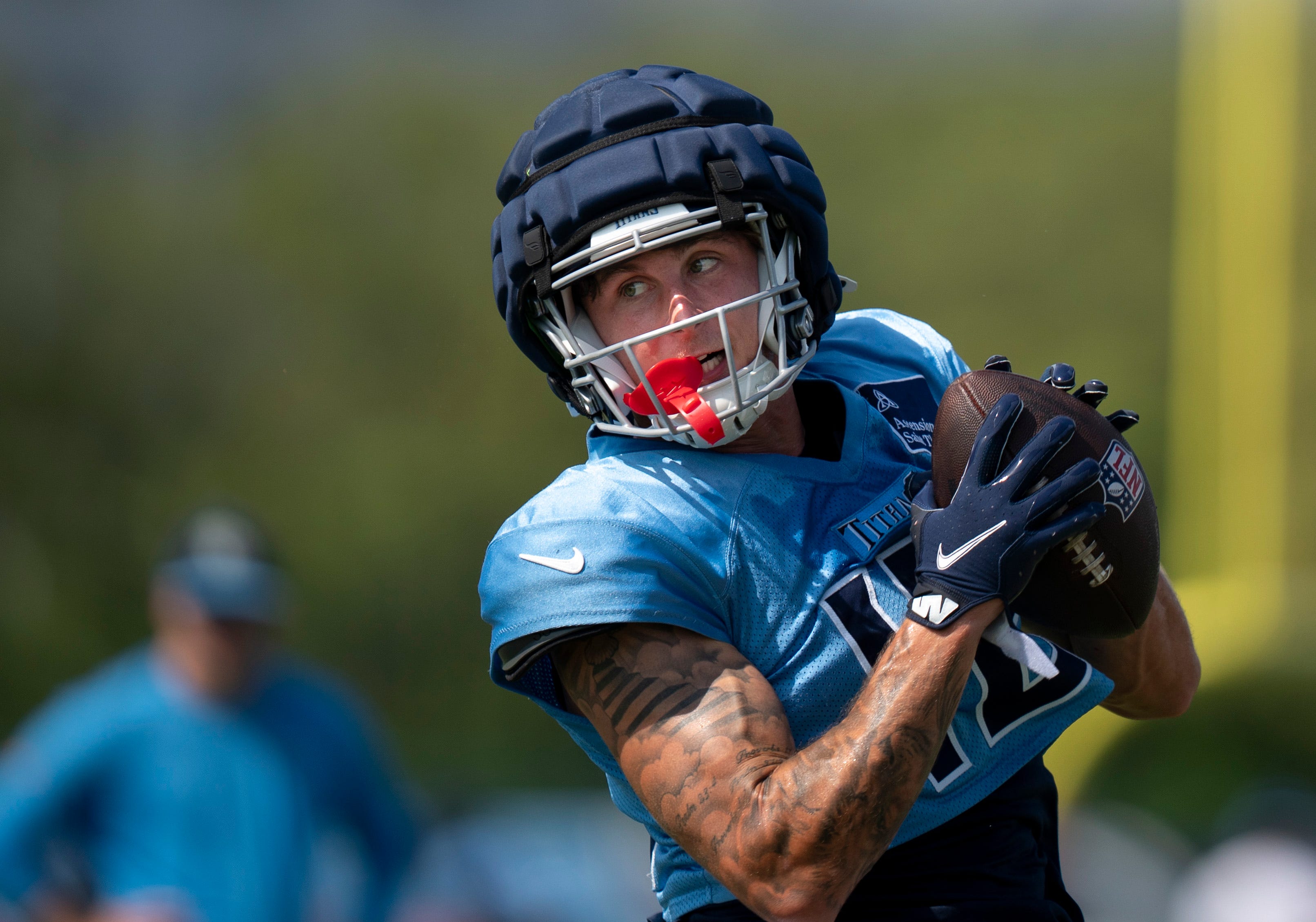Tennessee Titans wide receiver Mason Kinsey (12) makes a catch during drills at Ascension Saint Thomas Sports Park in Nashville, Tenn., Thursday, Aug. 15, 2024. This is the second day of the Titans jo... Denny Simmons / The Tennessean-USA TODAY NETWORK