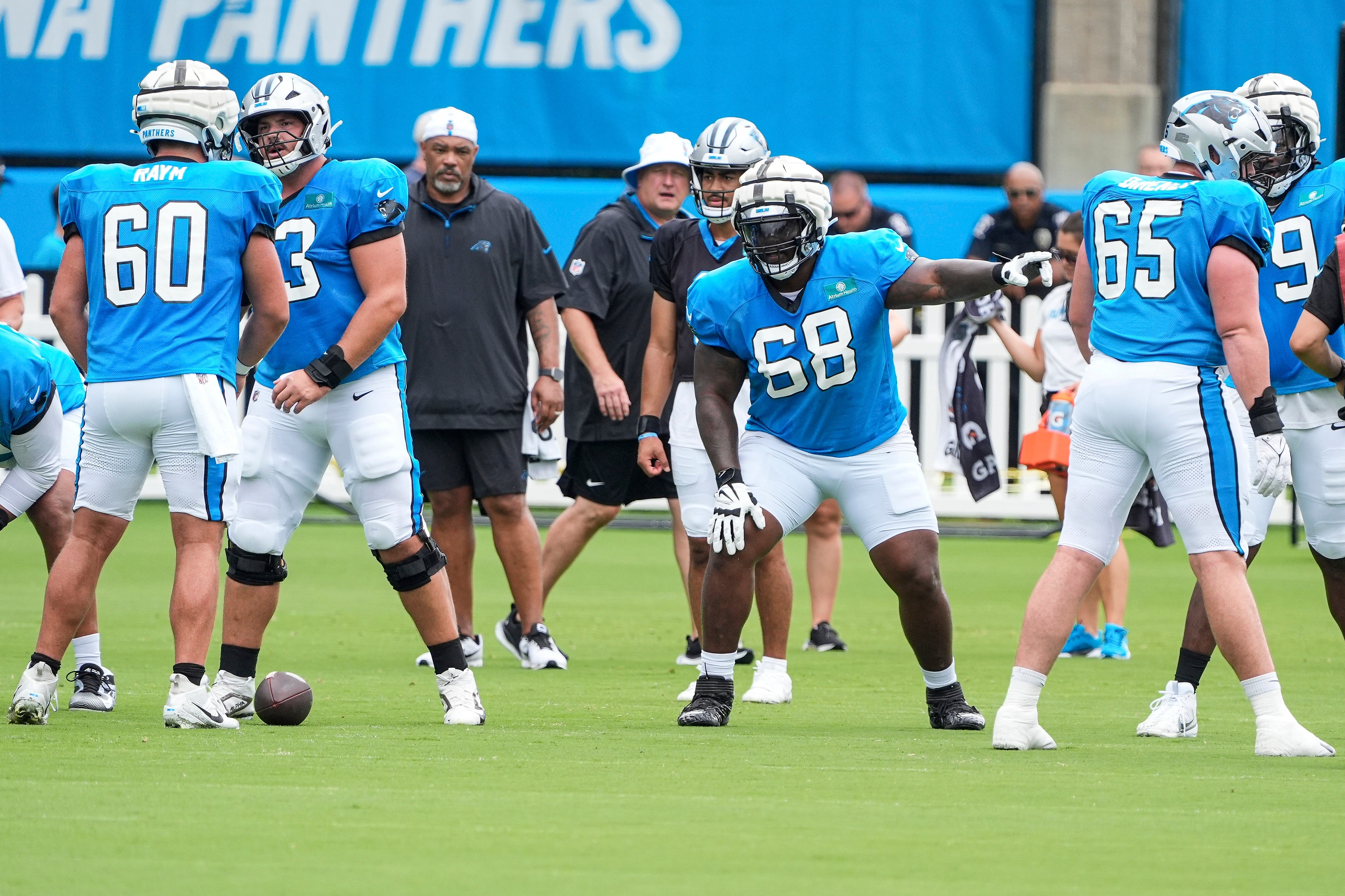 Jul 30, 2024; Charlotte, NC, USA;Carolina Panthers guard Damien Lewis (68) calls out to his line during training camp at Carolina Panthers Practice Fields. Mandatory Credit: Jim Dedmon-USA TODAY Sports