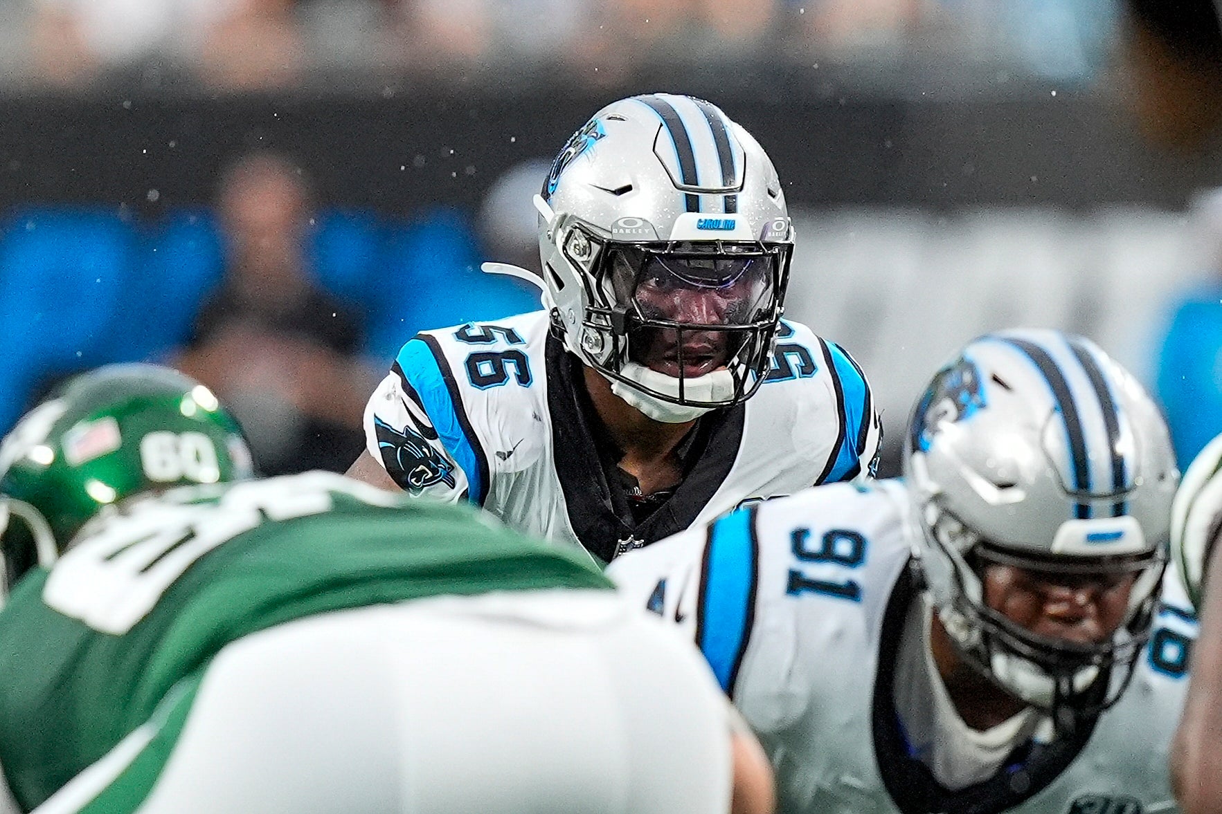 Aug 17, 2024; Charlotte, North Carolina, USA; Carolina Panthers linebacker Trevin Wallace (56) during the first quarter against the New York Jets at Bank of America Stadium. Mandatory Credit: Jim Dedmon-USA TODAY Sports