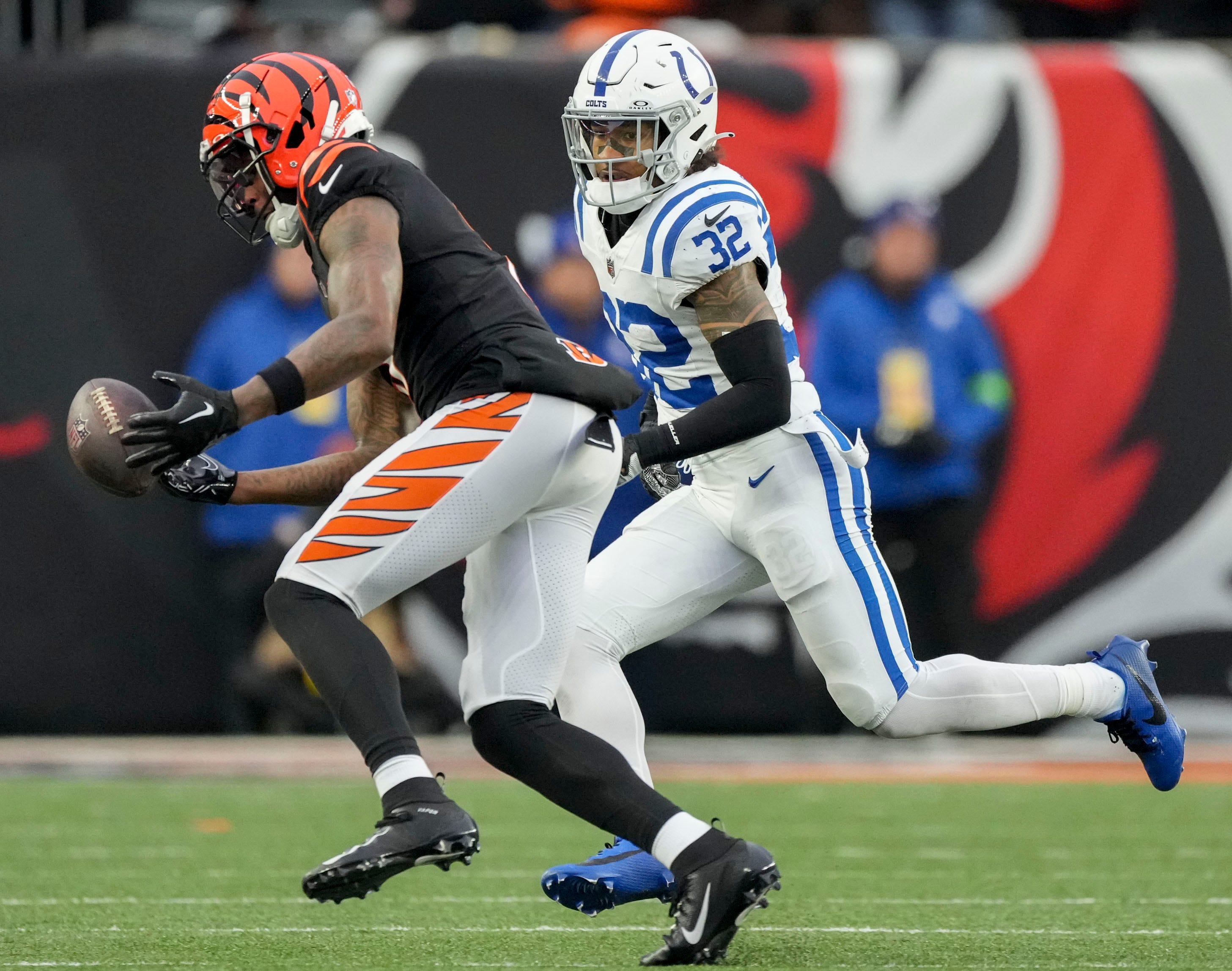 A pass intended for Cincinnati Bengals wide receiver Tee Higgins (5) goes incomplete as Indianapolis Colts safety Julian Blackmon (32) gives chase Sunday, Dec. 10, 2023, during a game against the Cincinnati Bengals at Paycor Stadium in Cincinnati.