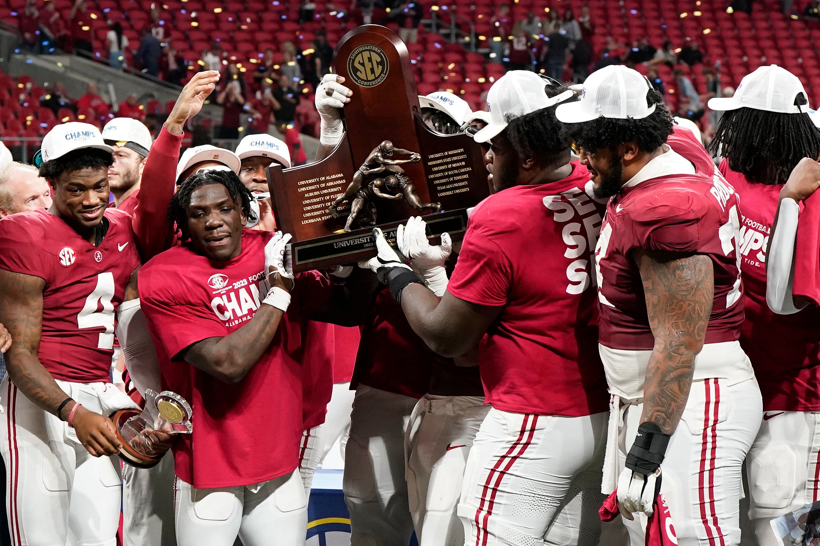 Dec 2, 2023; Atlanta, GA, USA; The Alabama Crimson Tide react after defeating the Georgia Bulldogs for the SEC Championship at Mercedes-Benz Stadium. Mandatory Credit: Dale Zanine-USA TODAY Sports