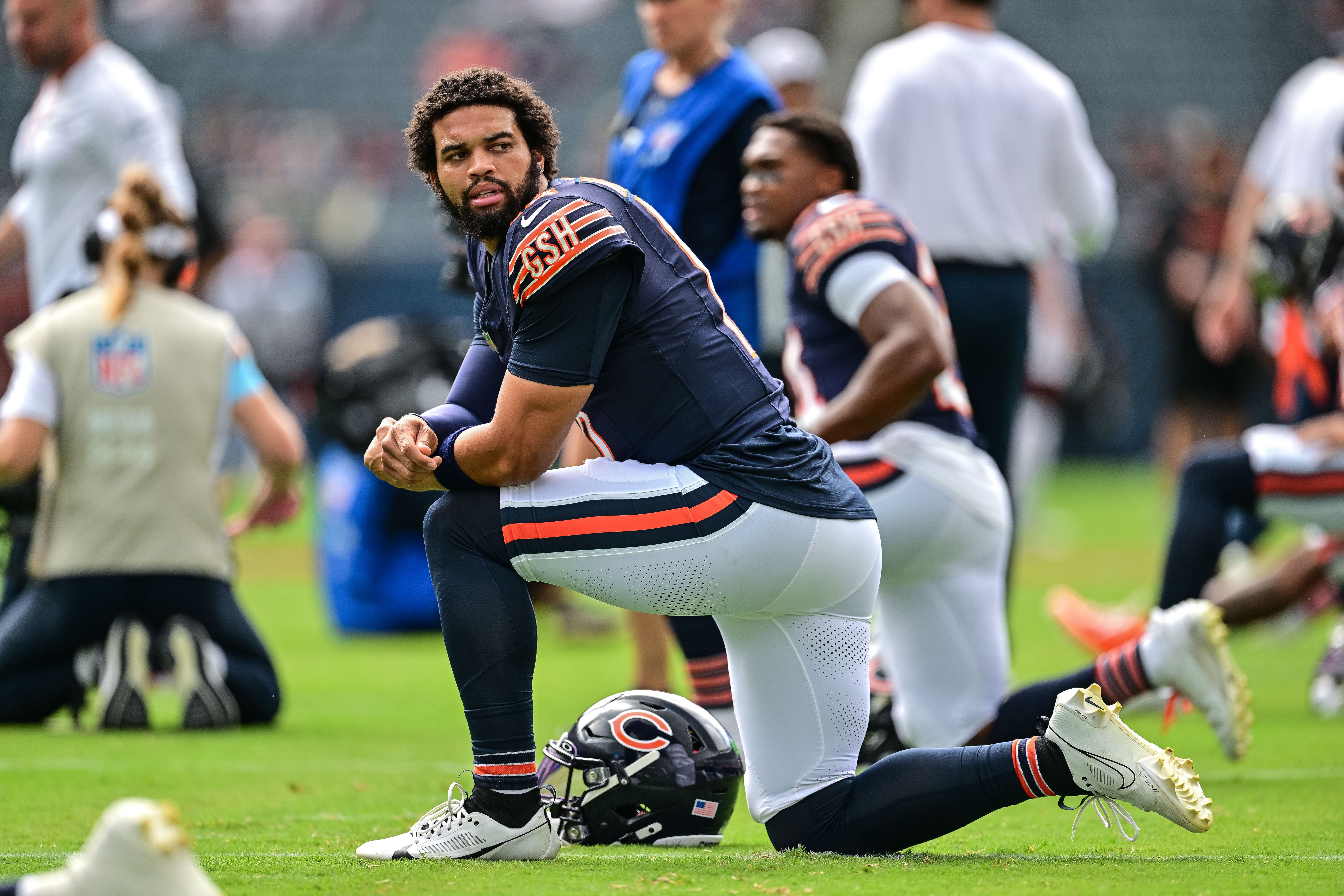 Aug 17, 2024; Chicago, Illinois, USA; Chicago Bears quarterback Caleb Williams (18) warms up before the game against the Cincinnati Bengals at Soldier Field.