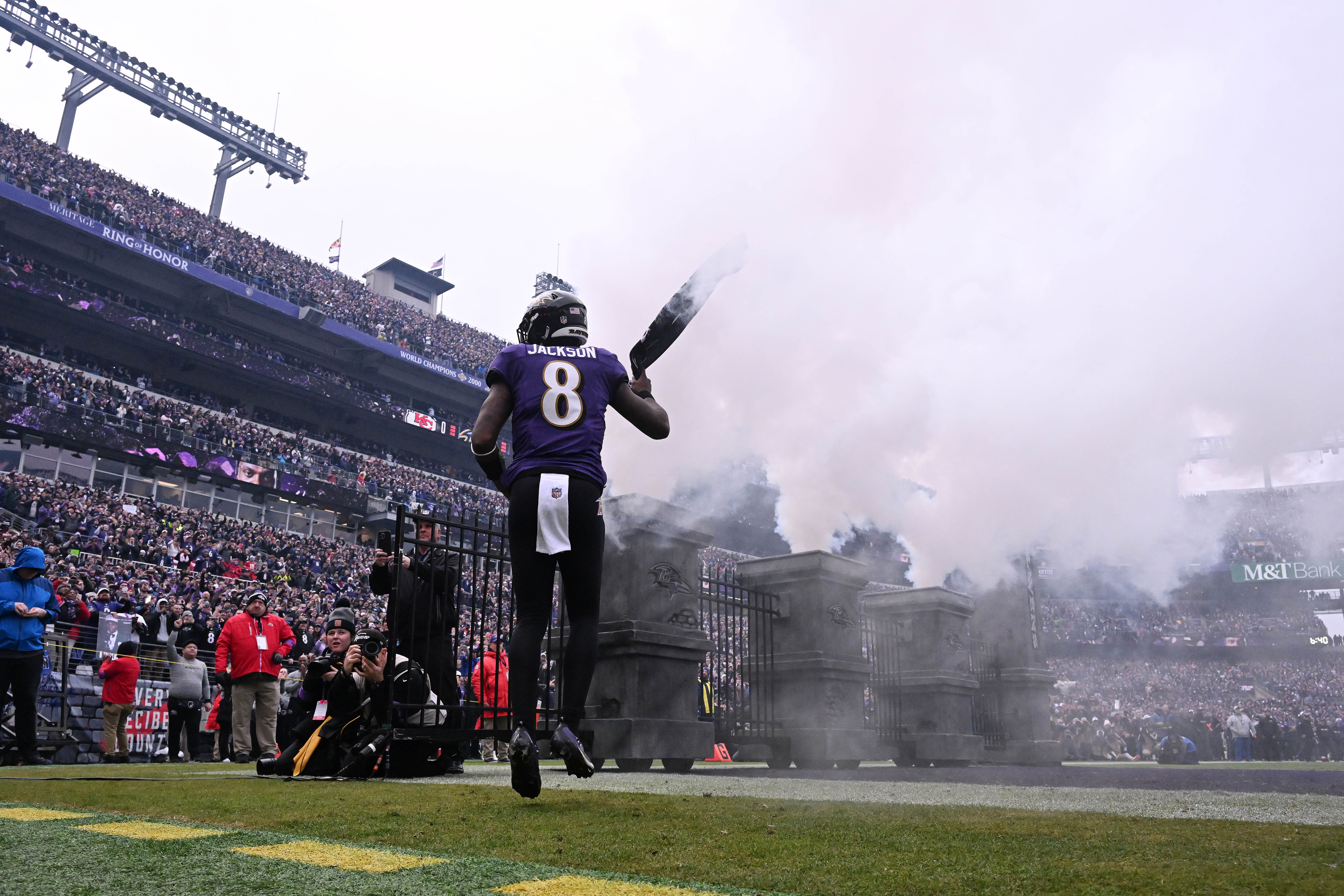 Jan 28, 2024; Baltimore, Maryland, USA; Baltimore Ravens quarterback Lamar Jackson (8) runs onto the field during player introductions prior to the AFC Championship football game against the Kansas City Chiefs at M&T Bank Stadium. Mandatory Credit: Tommy Gilligan-USA TODAY Sports