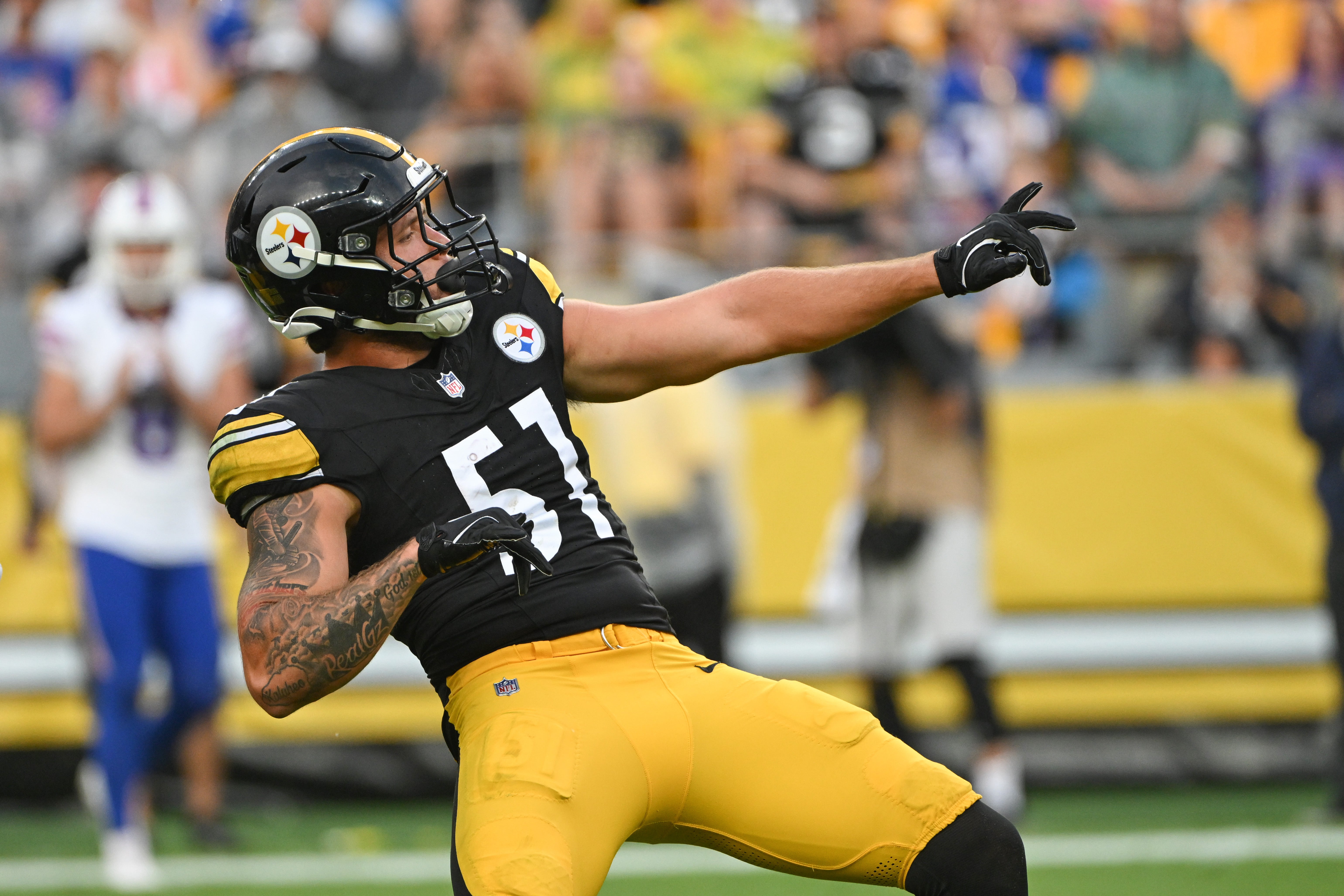 Aug 17, 2024; Pittsburgh, Pennsylvania, USA; Pittsburgh Steelers linebacker Nick Herbig (51) celebrates after sacking Buffalo Bills quarterback Mitchell Trubisky (11) during the first quarter at Acrisure Stadium. Mandatory Credit: Barry Reeger-USA TODAY Sports