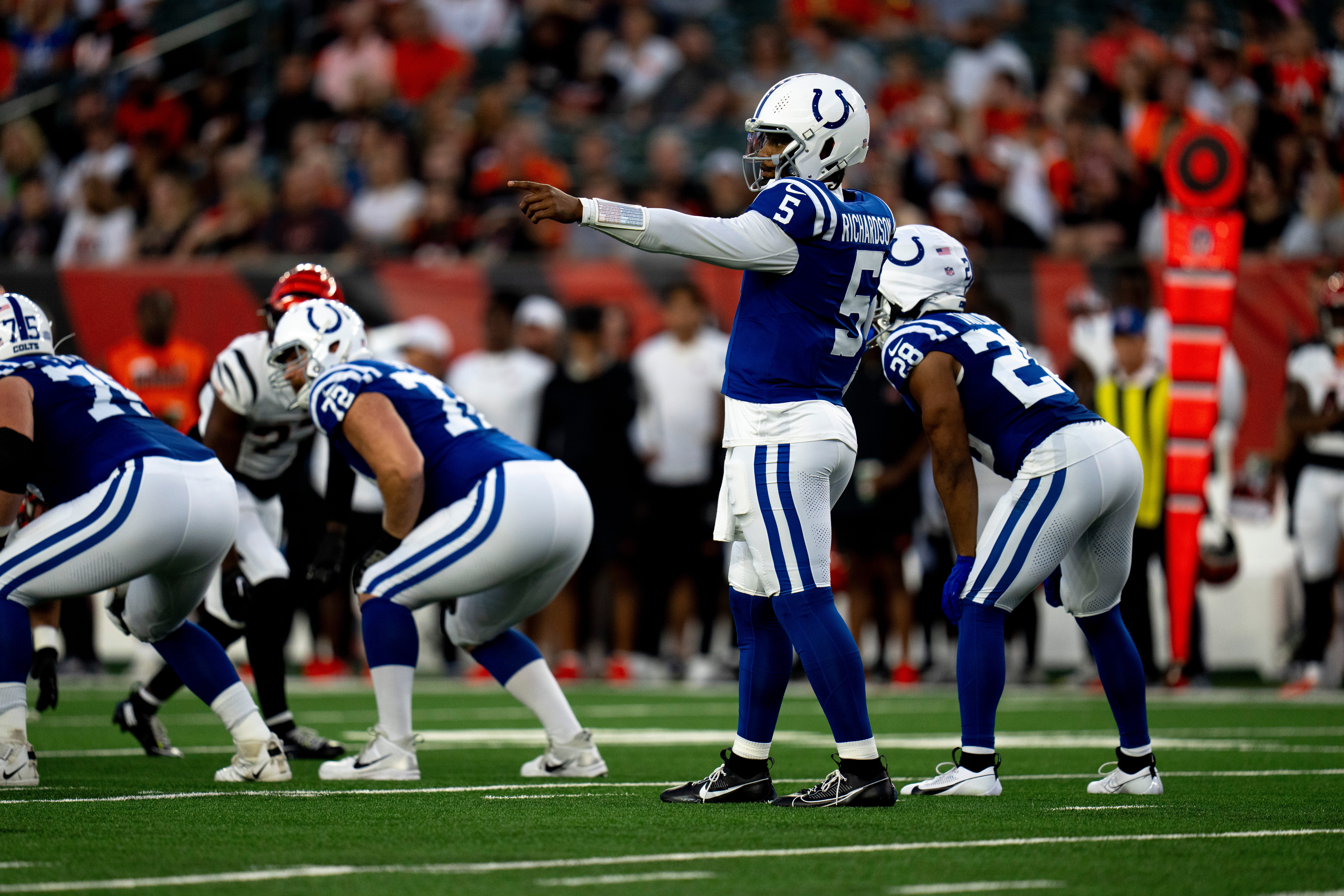 Indianapolis Colts quarterback Anthony Richardson (5) prepares to snap the ball in the first quarter of the NFL preseason game between the Cincinnati Bengals and the Indianapolis Colts at Paycor Stadium in Cincinnati on Thursday, Aug. 22, 2024.