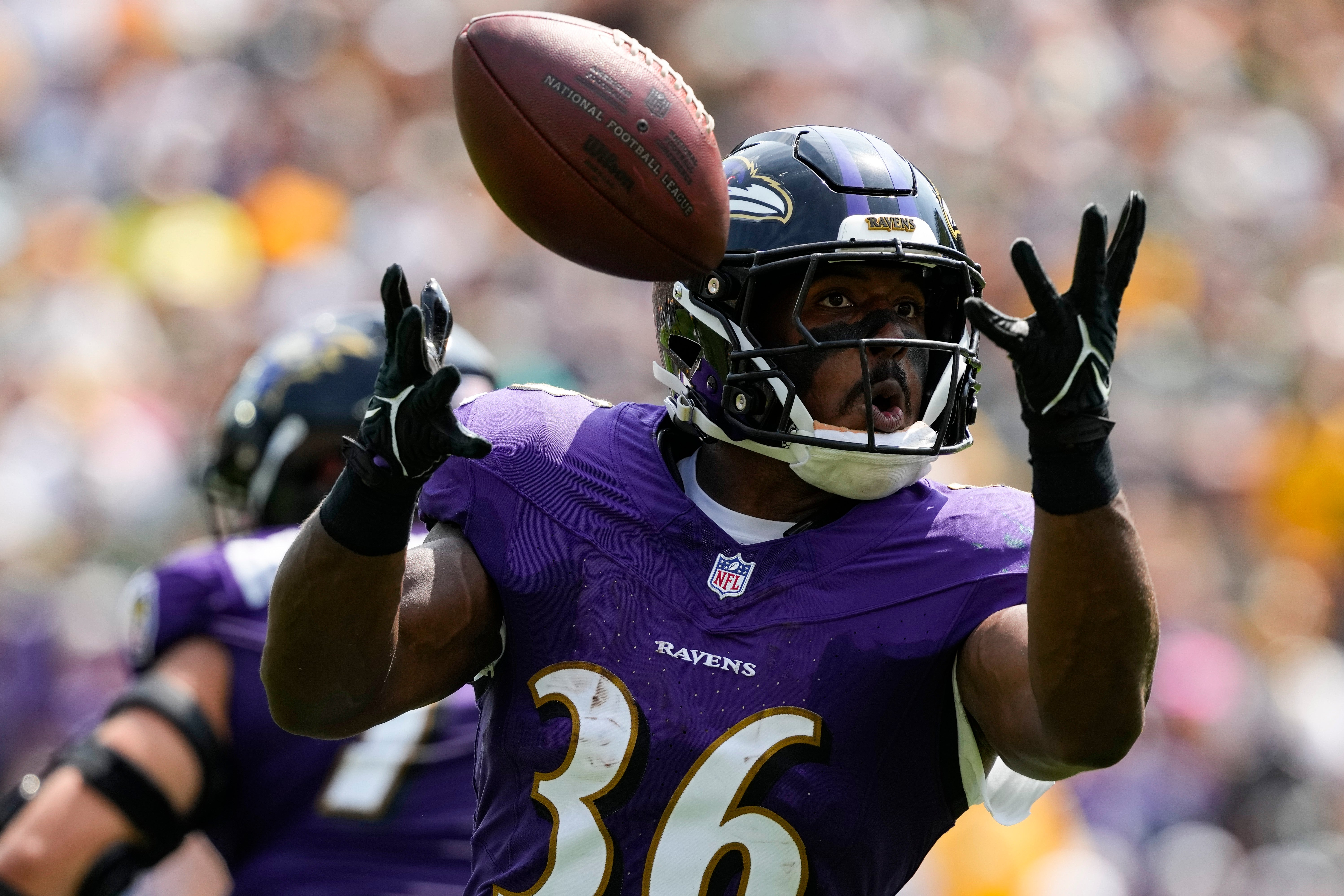 Aug 24, 2024; Green Bay, Wisconsin, USA; Baltimore Ravens running back Owen Wright (36) looks for the football during the first quarter against the Green Bay Packers at Lambeau Field. Mandatory Credit: Jeff Hanisch-USA TODAY Sports