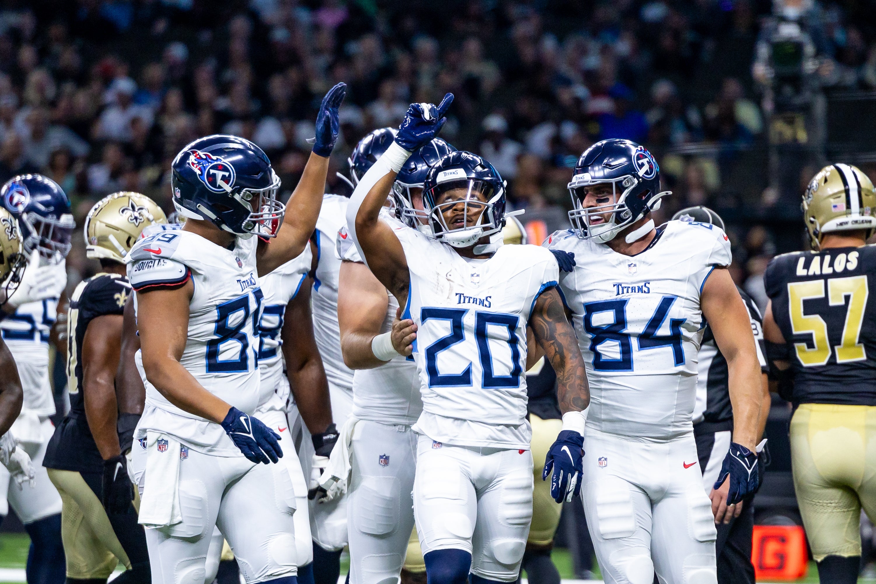 Tennessee Titans running back Tony Pollard (20) gives thanks for a touchdown against the New Orleans Saints during the first half at Caesars Superdome. Stephen Lew-USA TODAY Sports