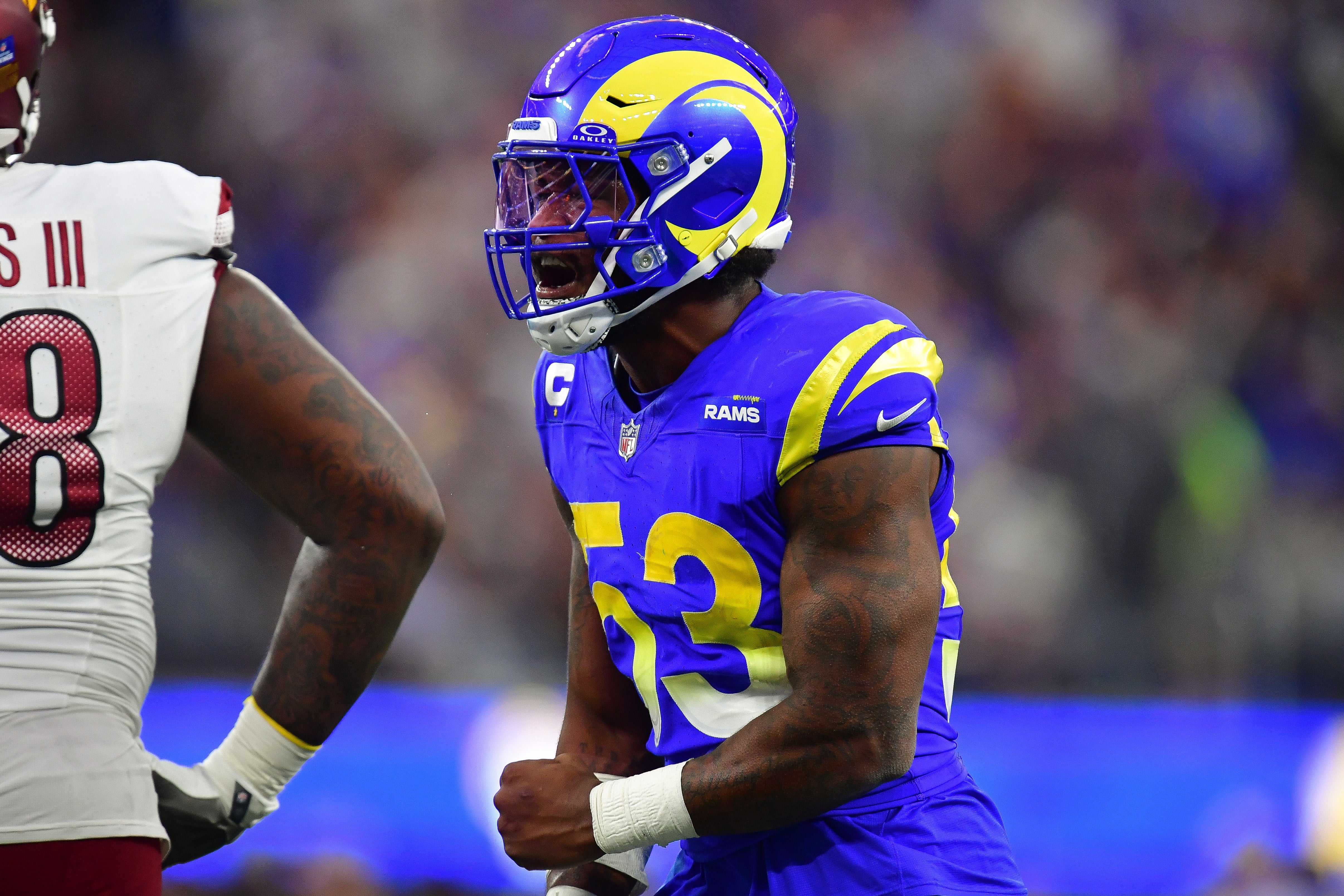 Dec 17, 2023; Inglewood, California, USA; Los Angeles Rams linebacker Ernest Jones (53) reacts after a defensive play against the Washington Commanders during the second half at SoFi Stadium. Mandatory Credit: Gary A. Vasquez-USA TODAY Sports