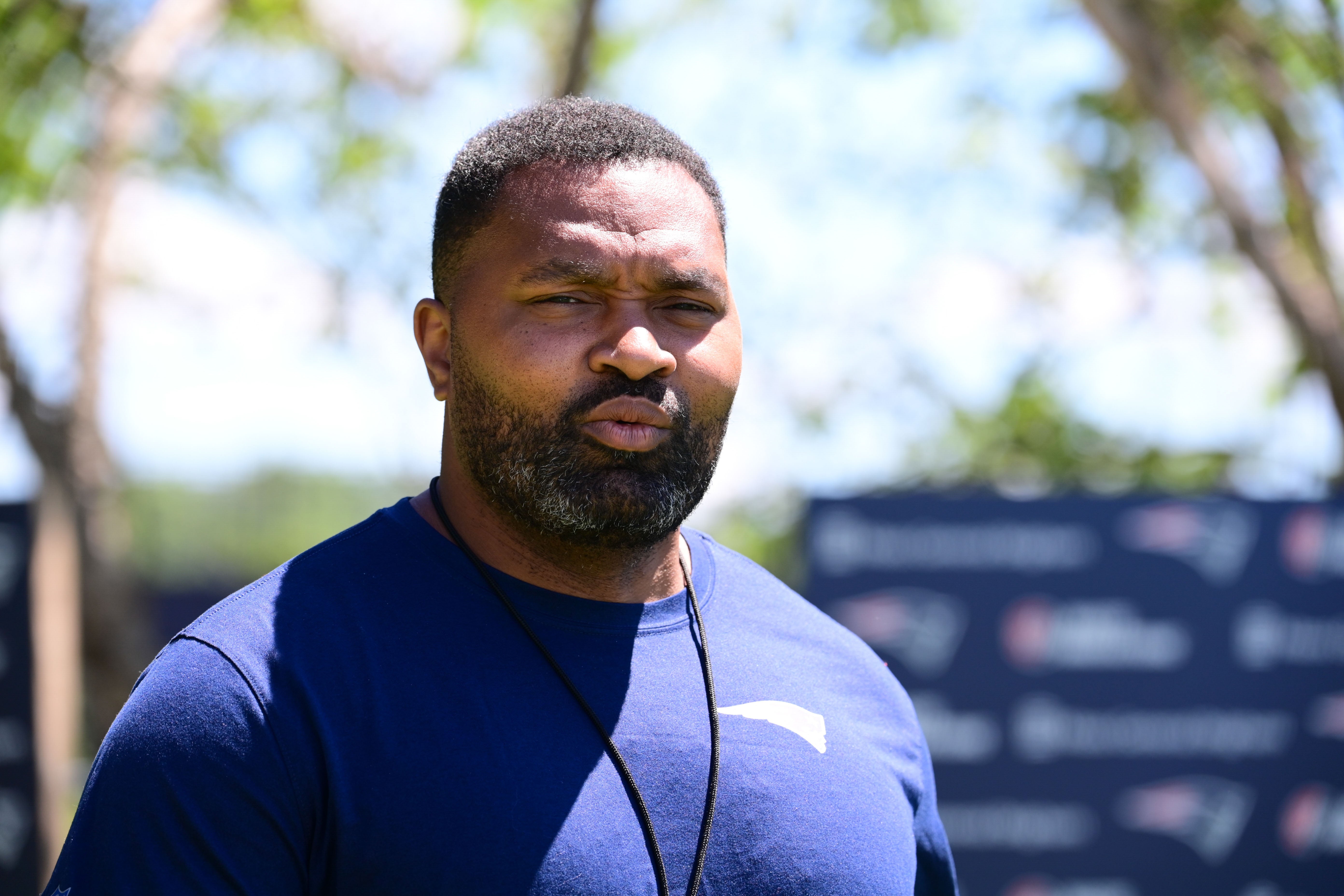 Jun 10, 2024; Foxborough, MA, USA; New England Patriots head coach Jerod Mayo walks to the microphones for to hold a press conference at minicamp at Gillette Stadium.