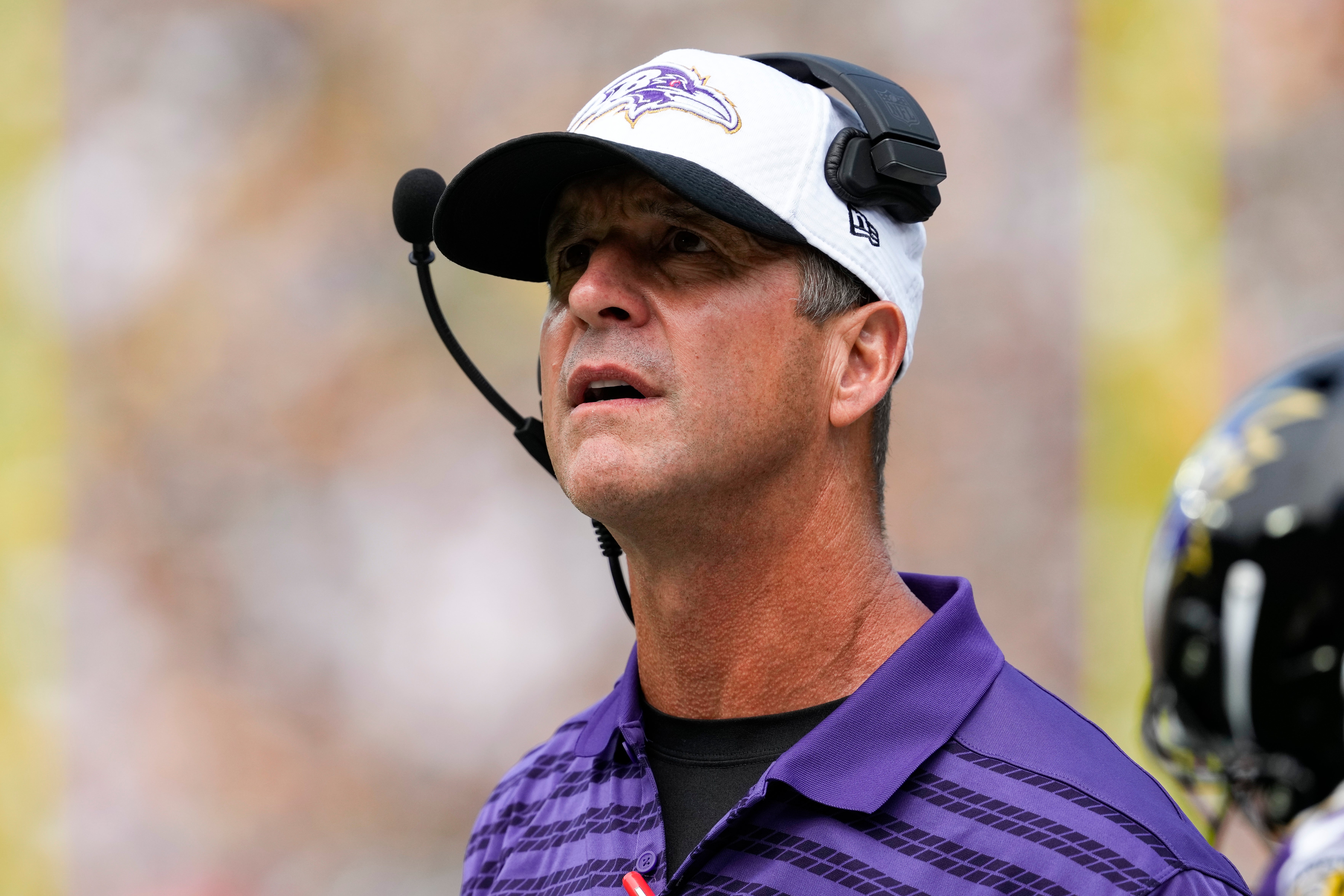 Aug 24, 2024; Green Bay, Wisconsin, USA; Baltimore Ravens head coach John Harbaugh looks on during the first quarter against the Green Bay Packers at Lambeau Field. Mandatory Credit: Jeff Hanisch-USA TODAY Sports