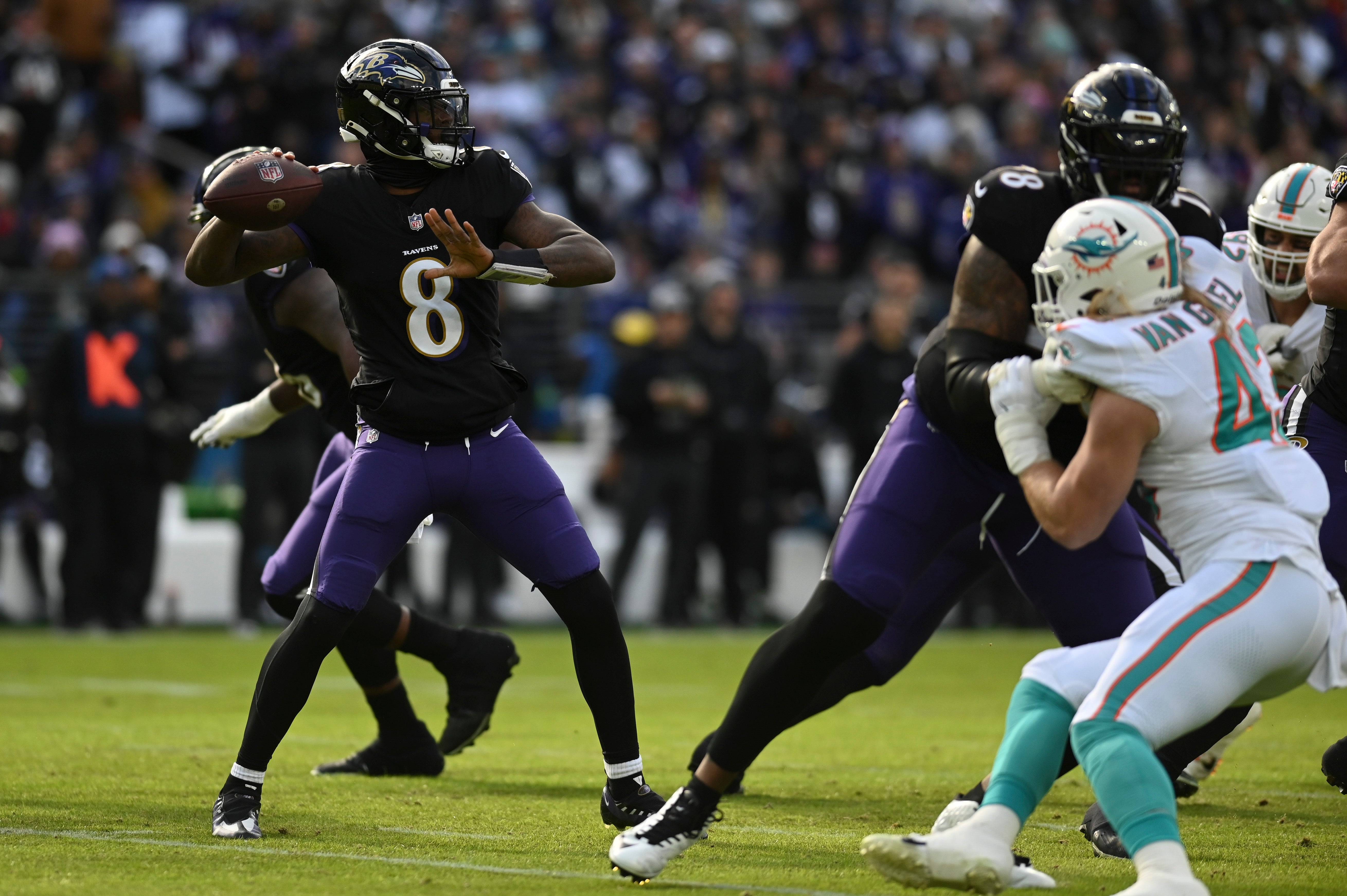 Dec 31, 2023; Baltimore, Maryland, USA; Baltimore Ravens quarterback Lamar Jackson (8) throws from the pocket during the first half against the Miami Dolphins at M&T Bank Stadium. Mandatory Credit: Tommy Gilligan-USA TODAY Sports