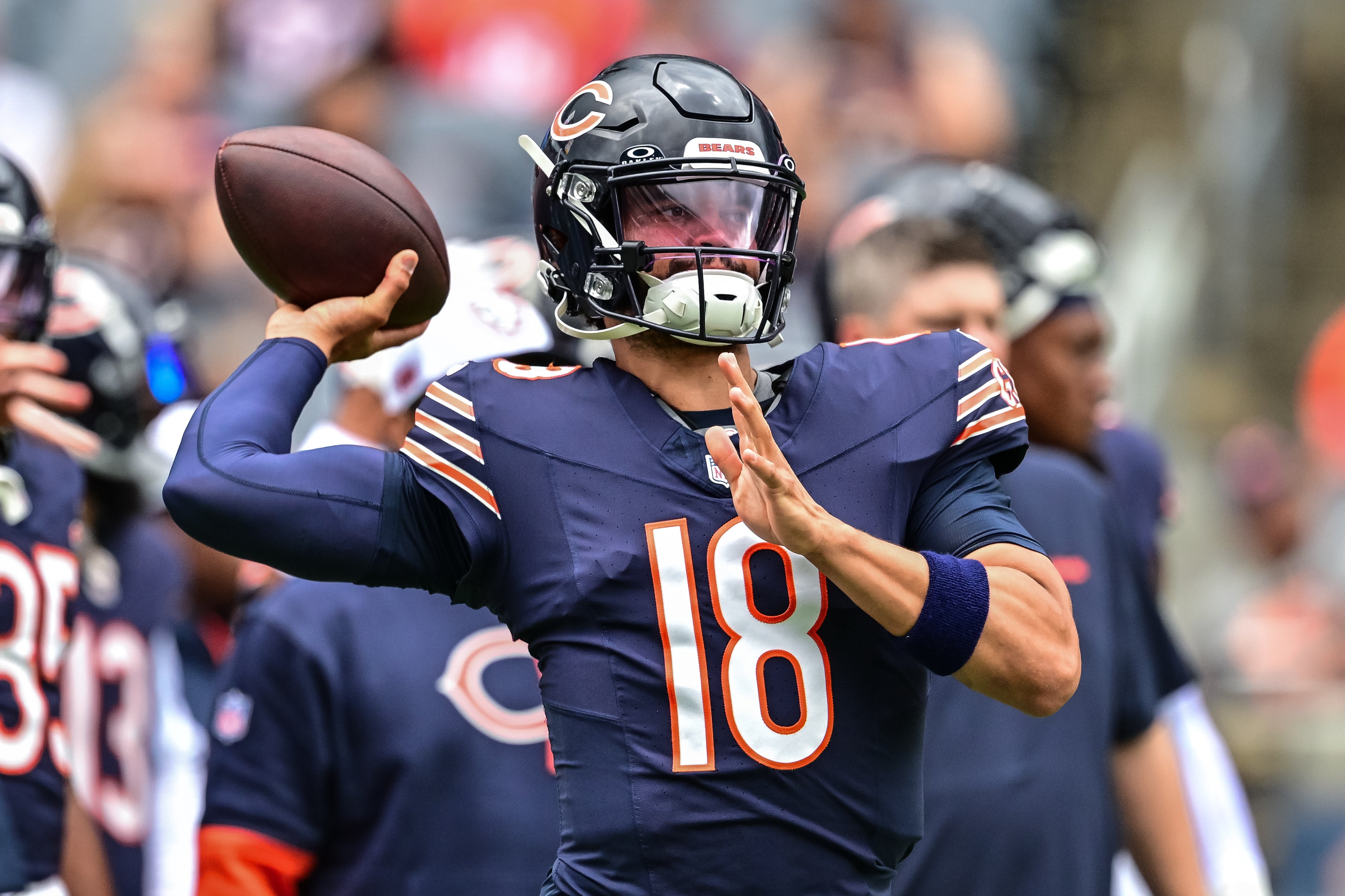 Aug 17, 2024; Chicago, Illinois, USA; Chicago Bears quarterback Caleb Williams (18) warms up before the game against the Cincinnati Bengals at Soldier Field.