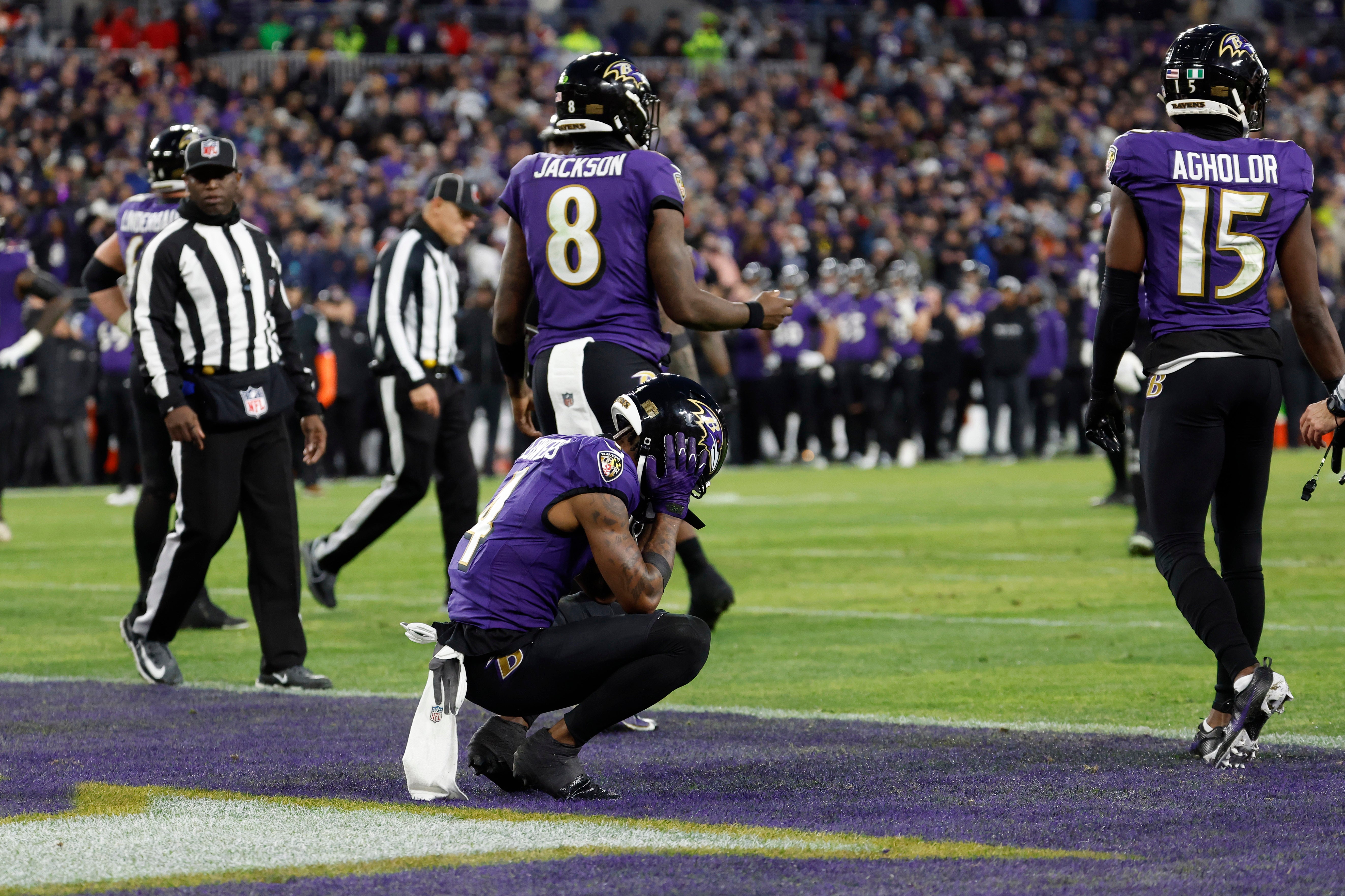Jan 28, 2024; Baltimore, Maryland, USA; Baltimore Ravens wide receiver Zay Flowers (4) reacts in the end zone after a fumble against the Kansas City Chiefs during the second half in the AFC Championship football game at M&T Bank Stadium. Mandatory Credit: Geoff Burke-USA TODAY Sports
