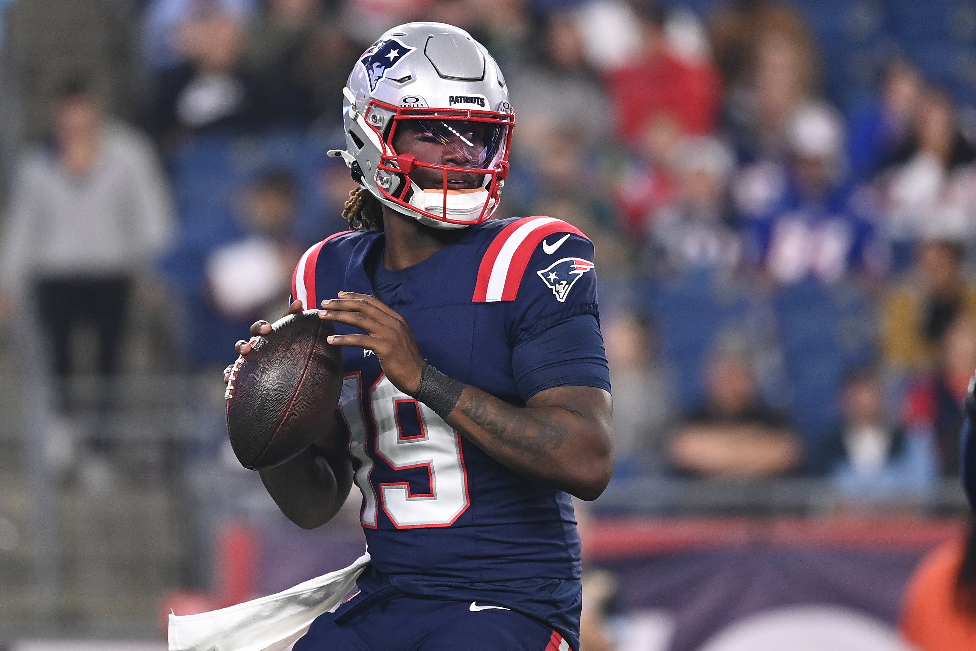 Aug 15, 2024; Foxborough, MA, USA; New England Patriots quarterback Joe Milton III (19) looks to pass during the second half against the Philadelphia Eagles at Gillette Stadium.