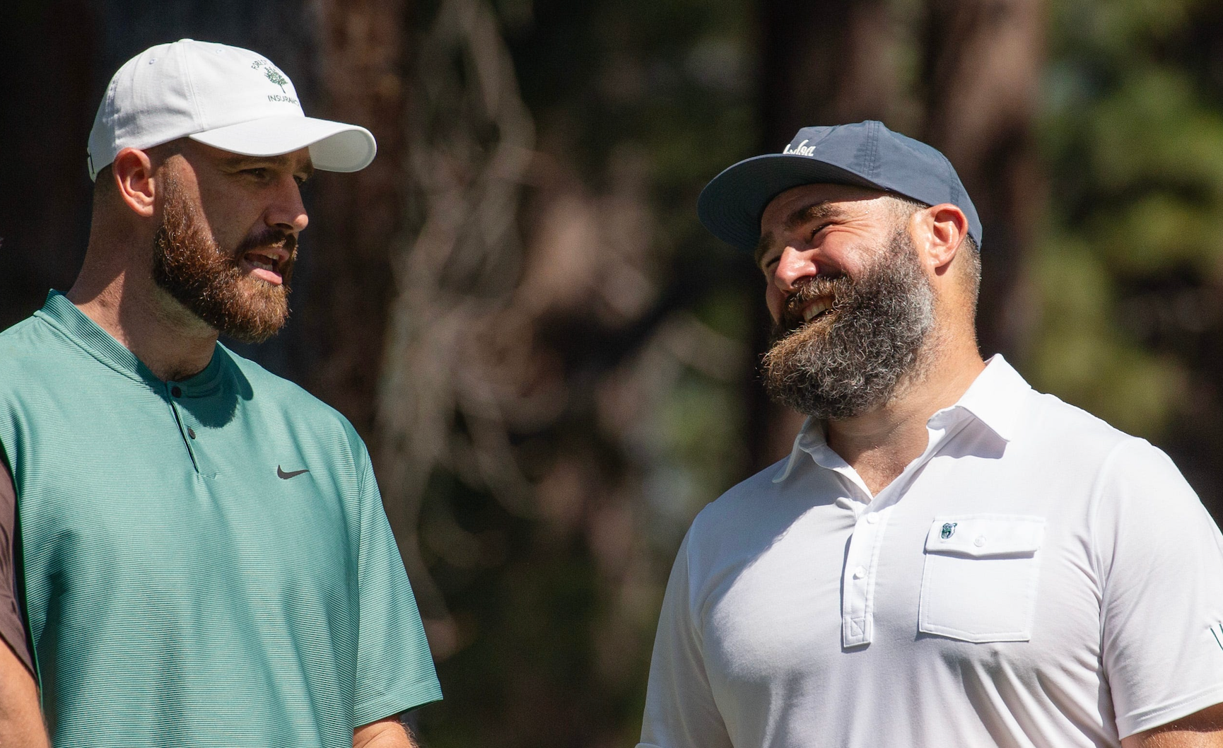 Travis Kelce and brother Jason Kelce talk on the 4th tee during the first round of the American Century Celebrity Championship golf tournament at Edgewood Tahoe Golf Course in Stateline, Nev., Friday, July 12, 2024.