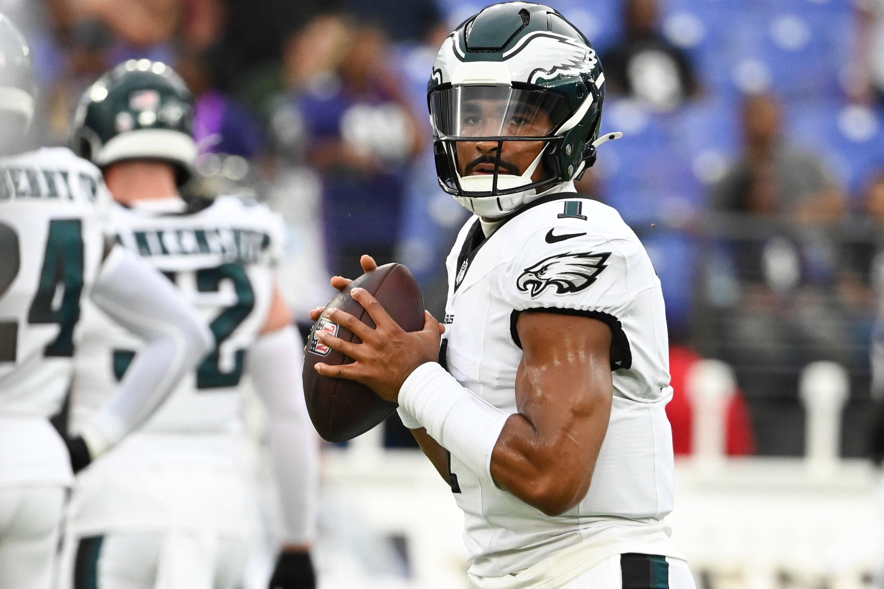 Philadelphia Eagles quarterback Jalen Hurts (1) looks to throw before a preseason game against the Baltimore Ravens at M&T Bank Stadium.