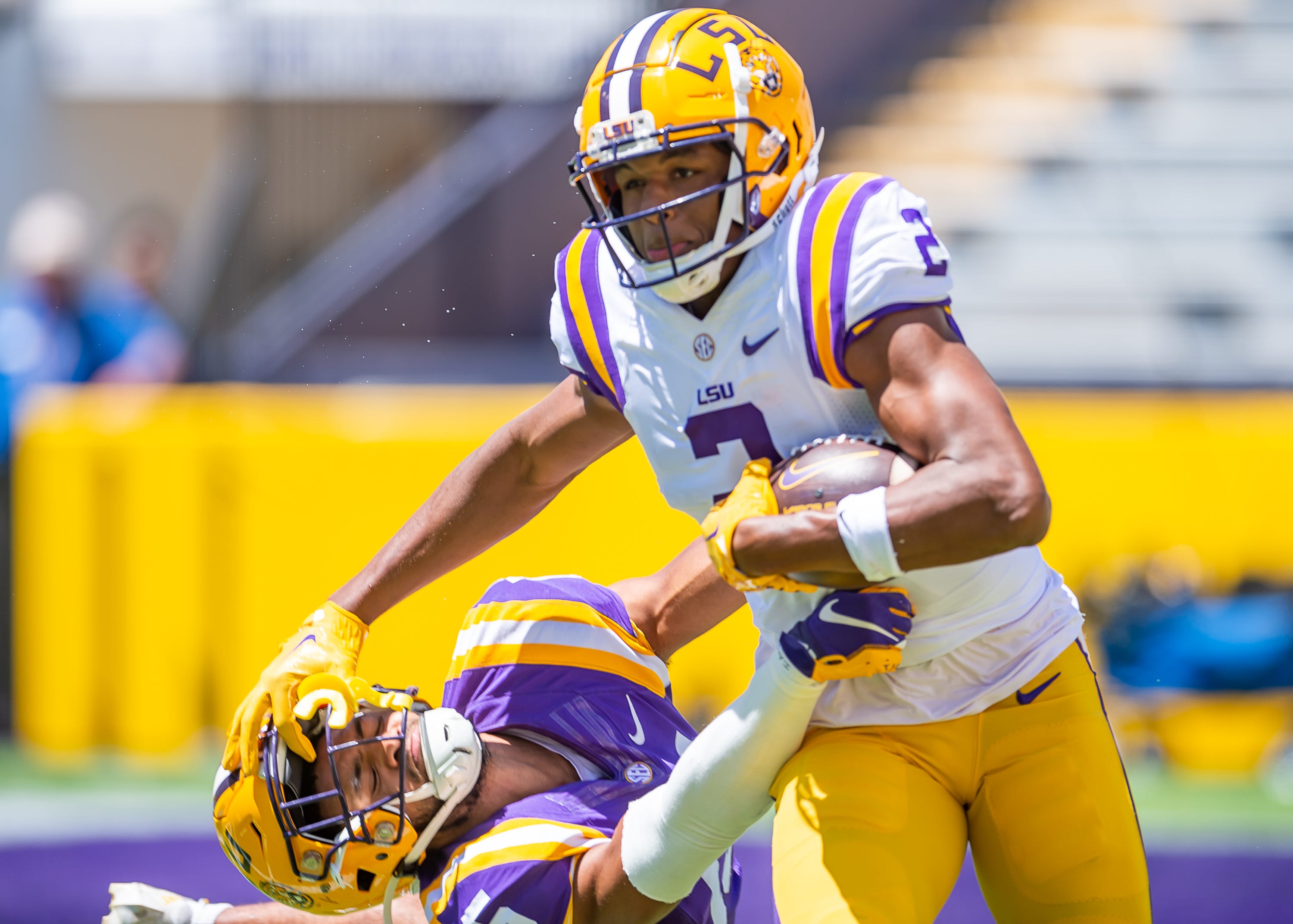 Kyren Lacy with a stiff arm