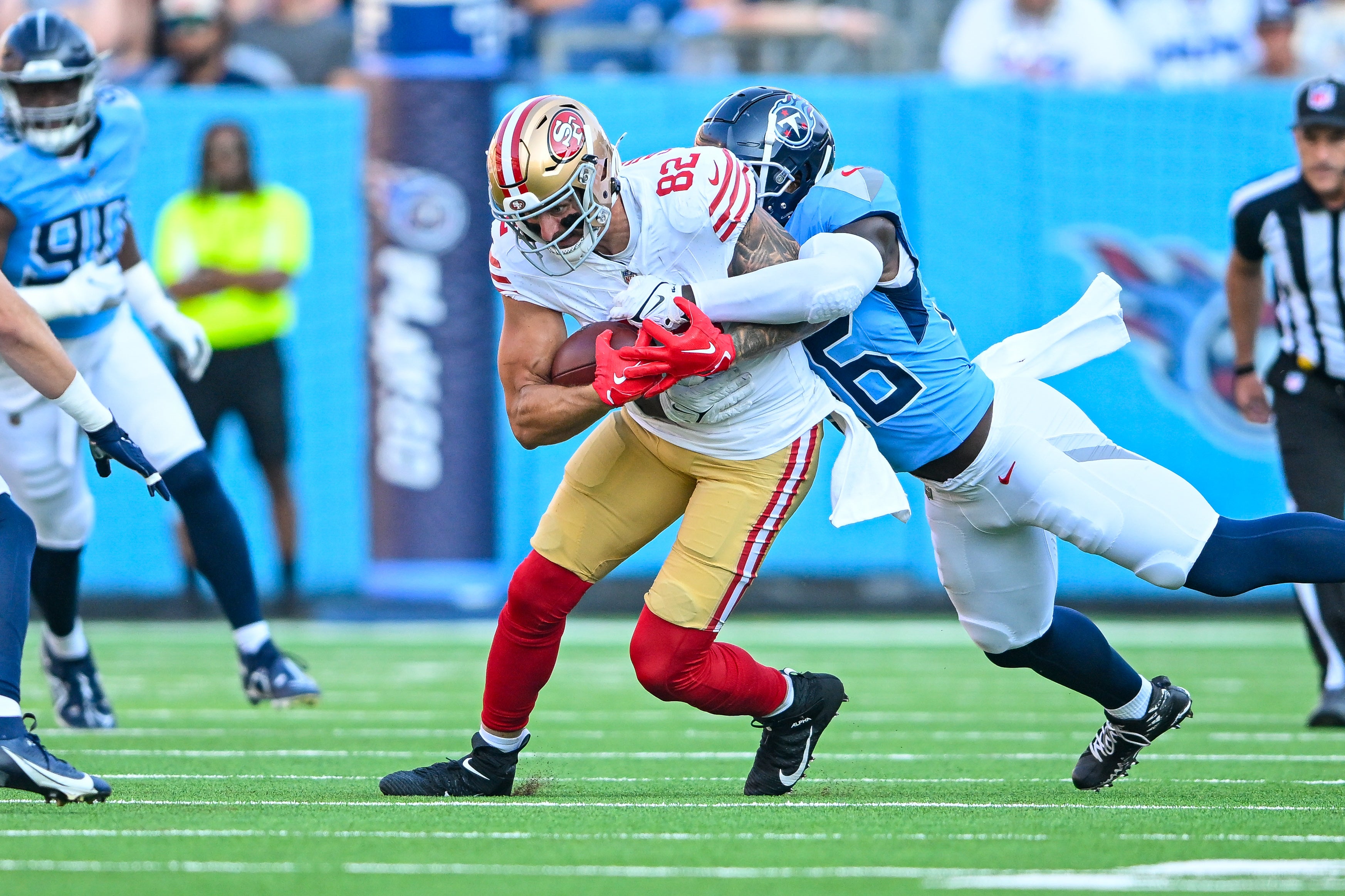 Aug 10, 2024; Nashville, Tennessee, USA; San Francisco 49ers tight end Eric Saubert (82) runs the ball against the Tennessee Titans during the first half at Nissan Stadium.