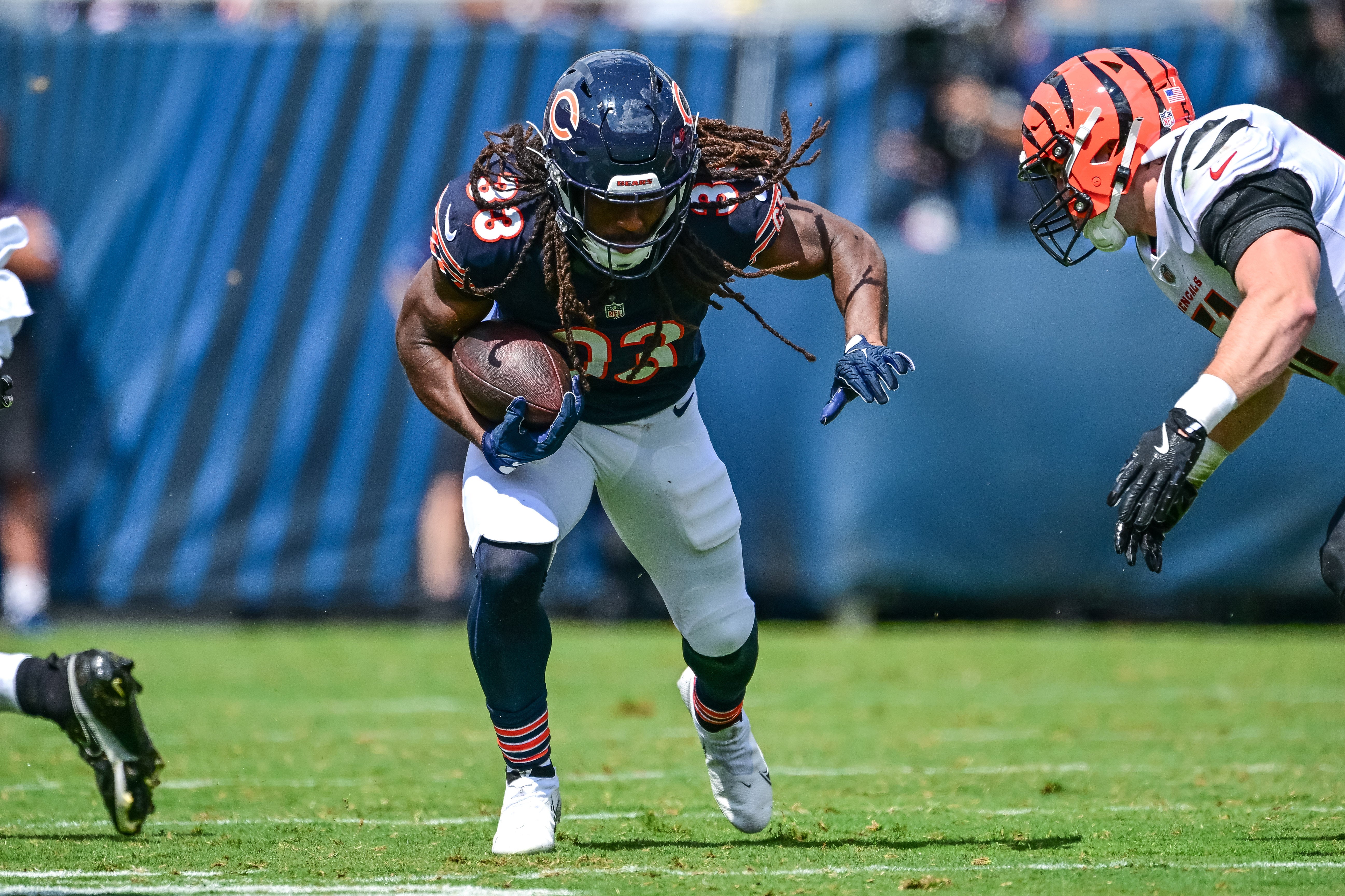 Aug 17, 2024; Chicago, Illinois, USA; Chicago Bears running back Ian Wheeler (33) runs the ball against the Cincinnati Bengals during the fourth quarter at Soldier Field.