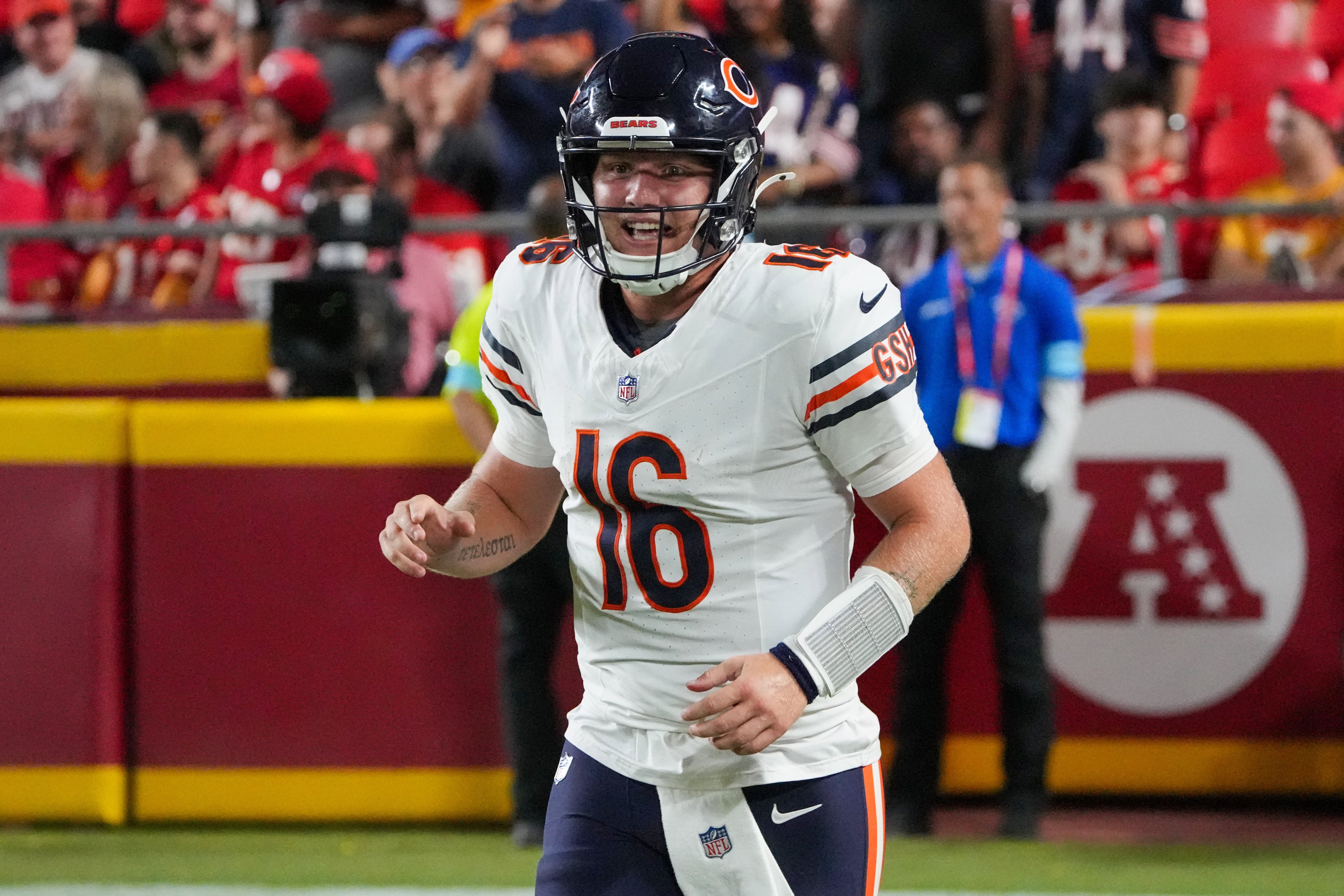 Aug 22, 2024; Kansas City, Missouri, USA; Chicago Bears quarterback Austin Reed (16) celebrates after a score against the Kansas City Chiefs during the second half at GEHA Field at Arrowhead Stadium.