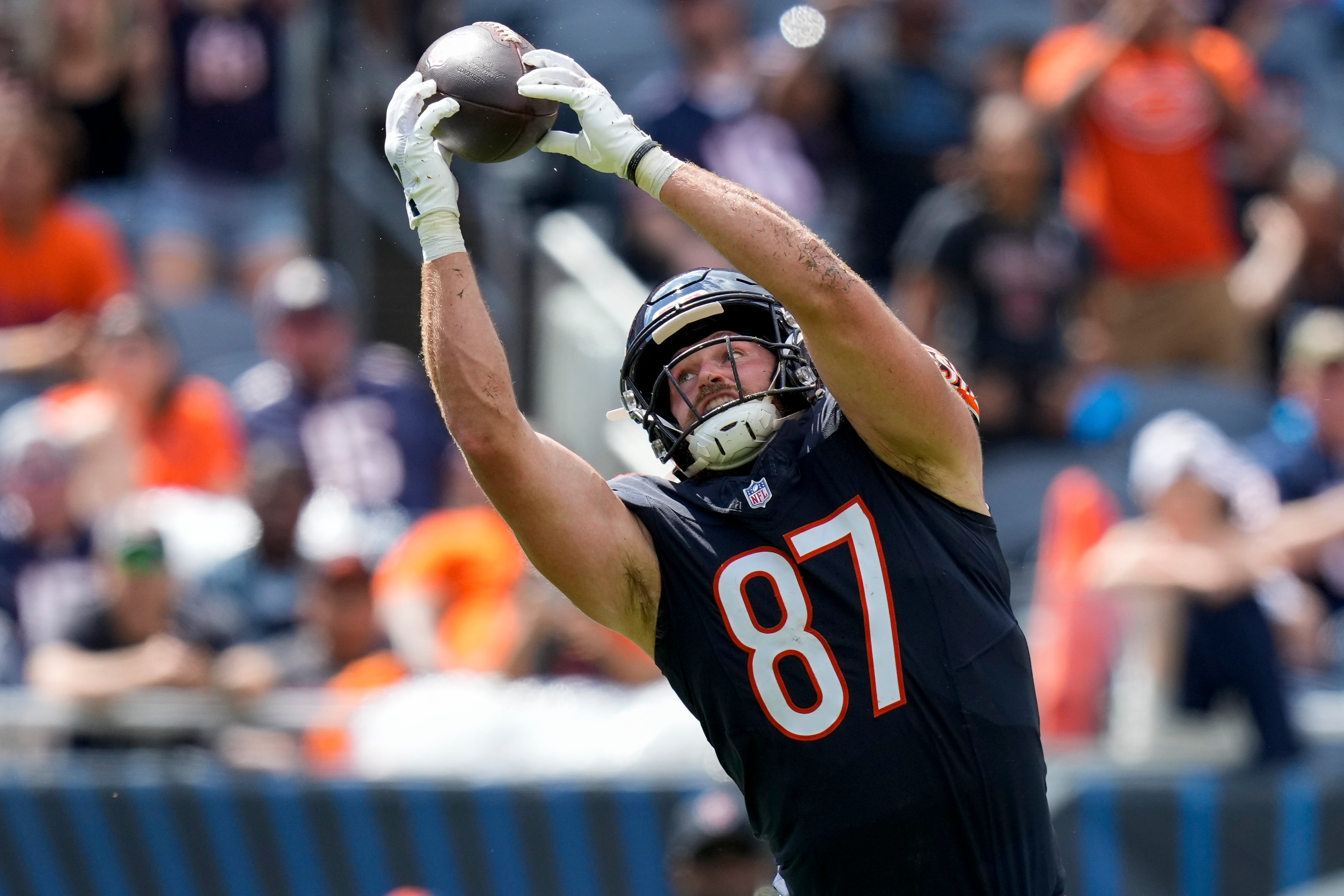 Aug 17, 2024; Chicago, Illinois, USA; Chicago Bears tight end Brenden Bates (87) catches a pass over the middle in the fourth quarter against the Cincinnati Bengals at Soldier Field.