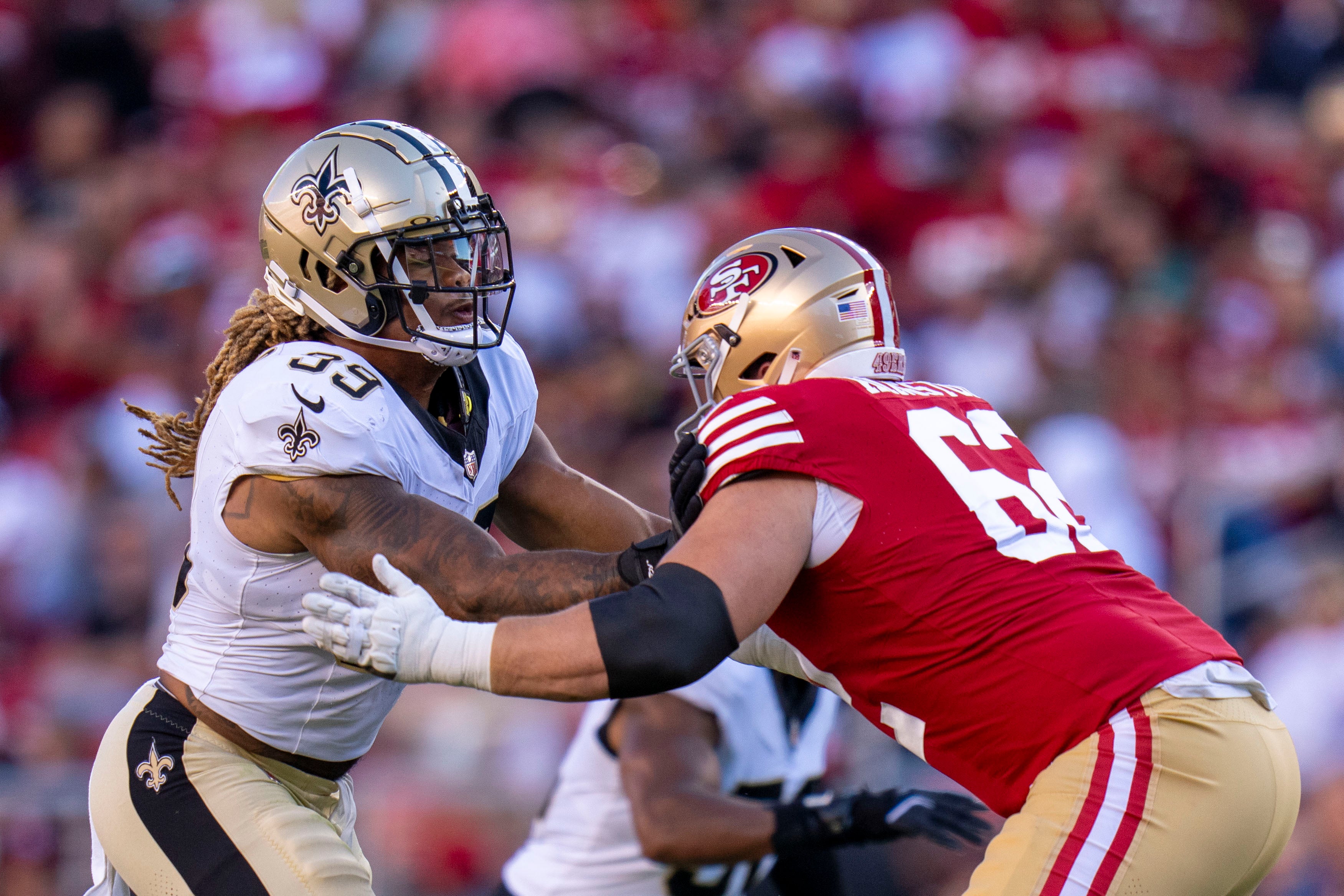 August 18, 2024; Santa Clara, California, USA; New Orleans Saints defensive end Chase Young (99) rushes against San Francisco 49ers guard Jarrett Kingston (62) during the second quarter at Levi's Stadium.