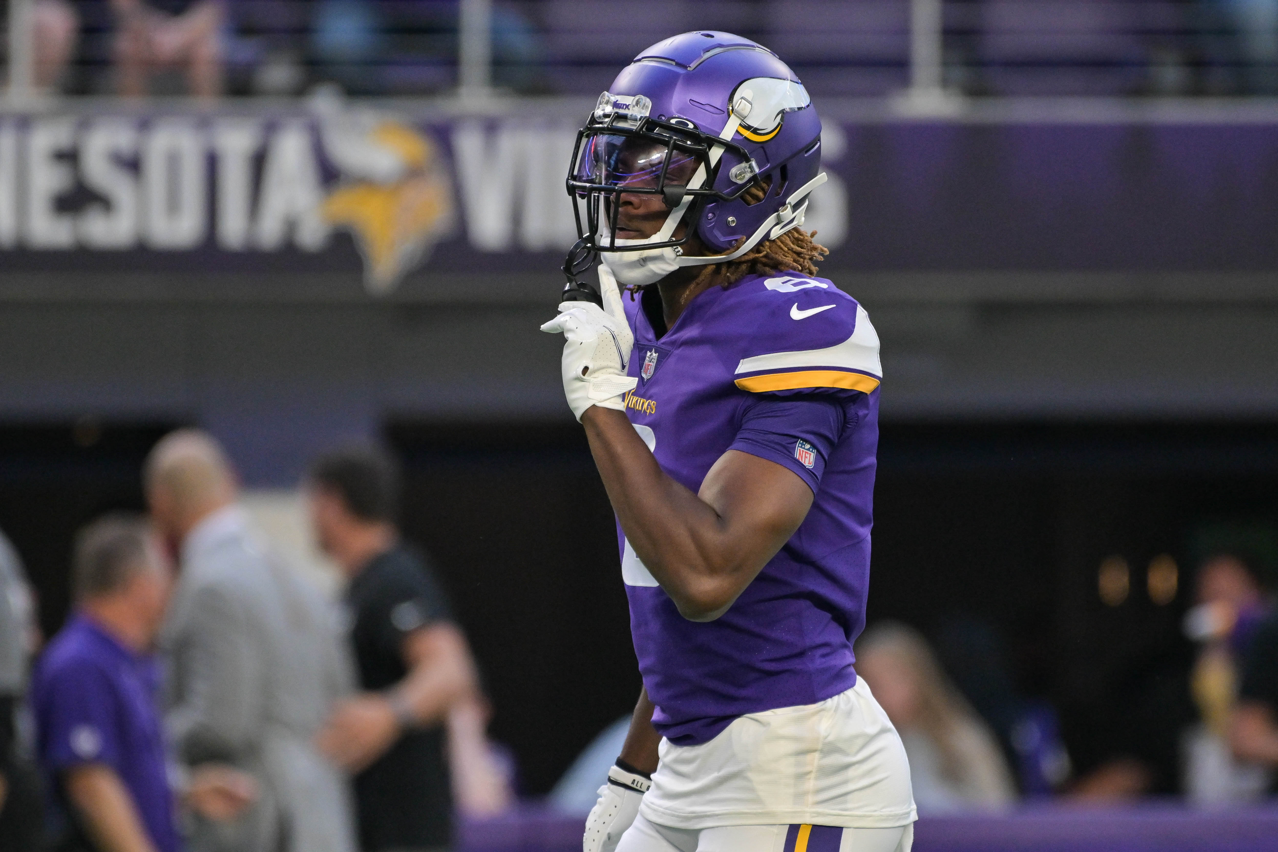Minnesota Vikings safety Lewis Cine (6) warms up before the game against the San Francisco 49ers at U.S. Bank Stadium.