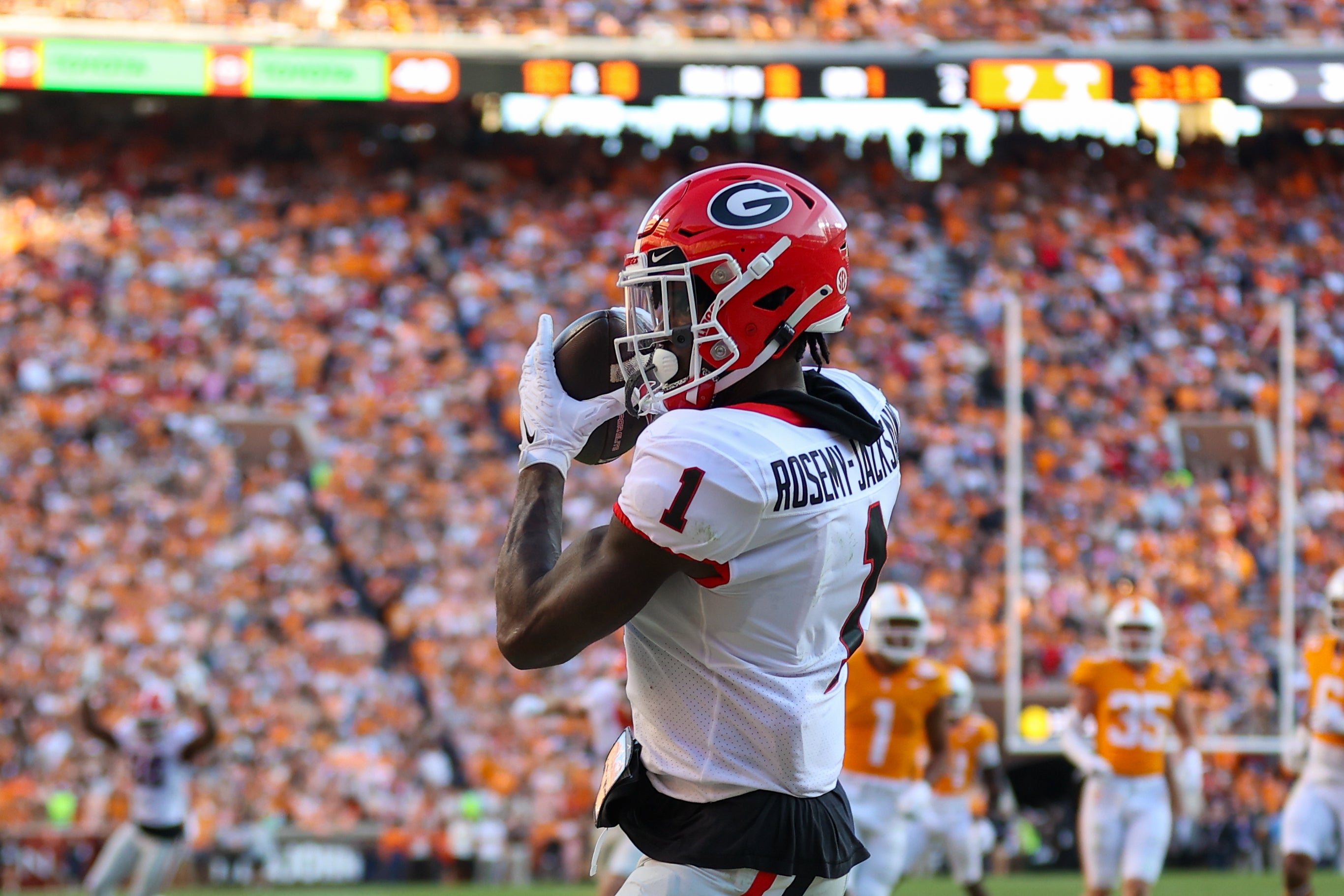 Georgia Bulldogs wide receiver Marcus Rosemy-Jacksaint (1) catches a pass for a touchdown against the Tennessee Volunteers during the first half at Neyland Stadium.