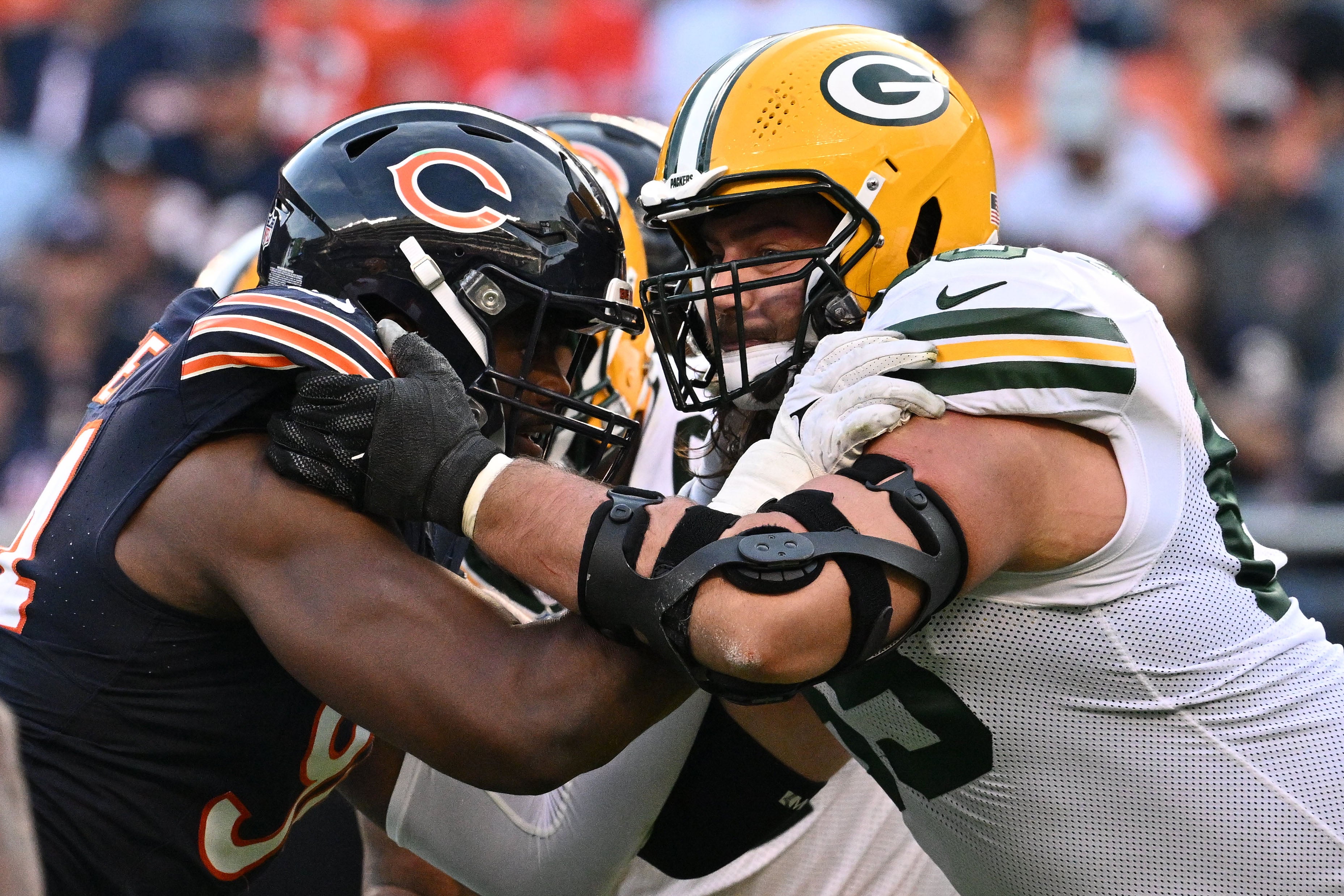 Sep 10, 2023; Chicago, Illinois, USA; Chicago Bears defensive lineman Rasheem Green (94) and Green Bay Packers tackle David Bakhtiari (69) at Soldier Field.