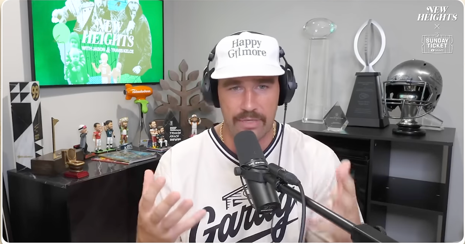 Travis Kelce wears a Happy Gilmore hat on New Heights podcast