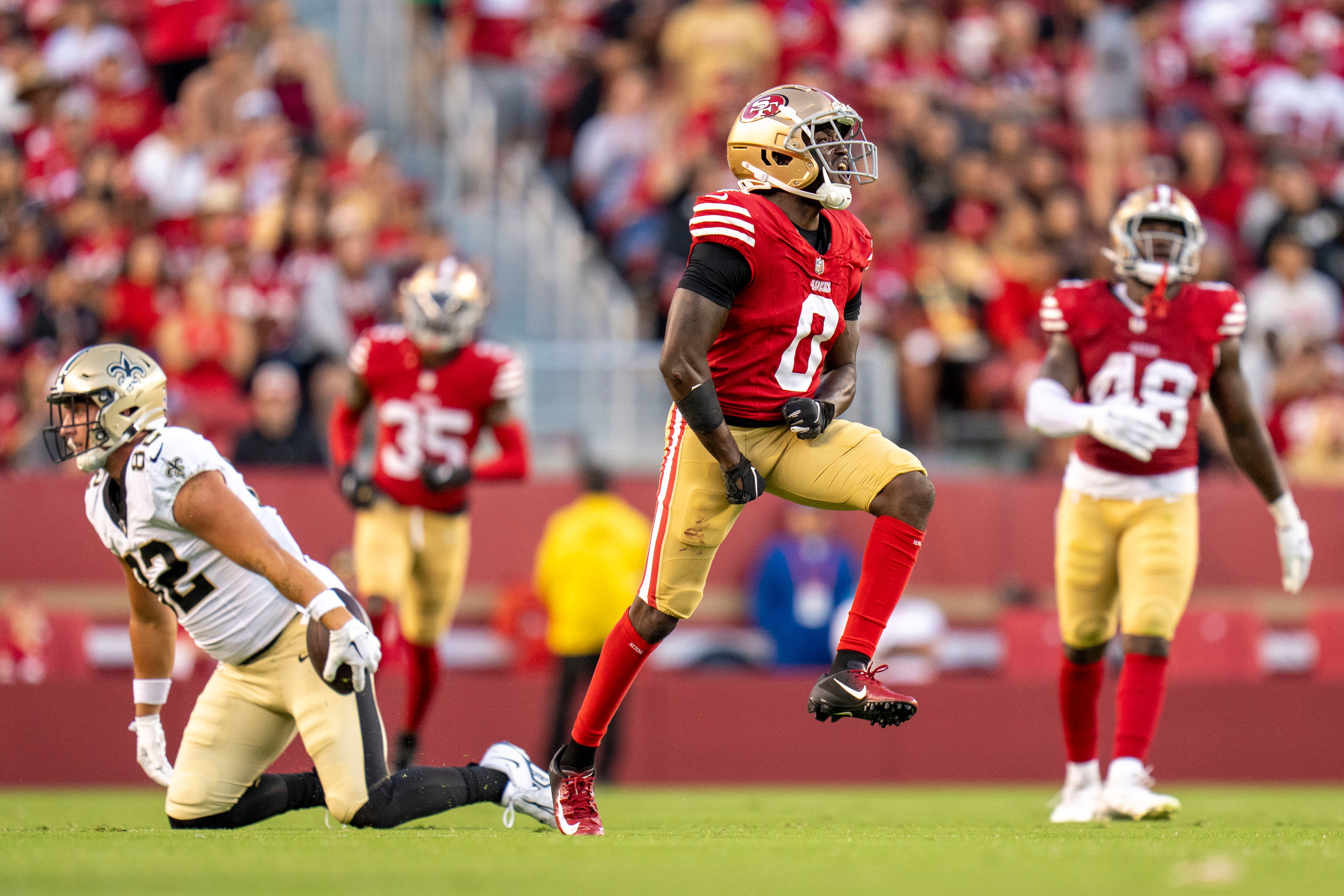 August 18, 2024; Santa Clara, California, USA; San Francisco 49ers cornerback Samuel Womack III (0) celebrates after a defensive stop against the New Orleans Saints during the fourth quarter at Levi's Stadium.