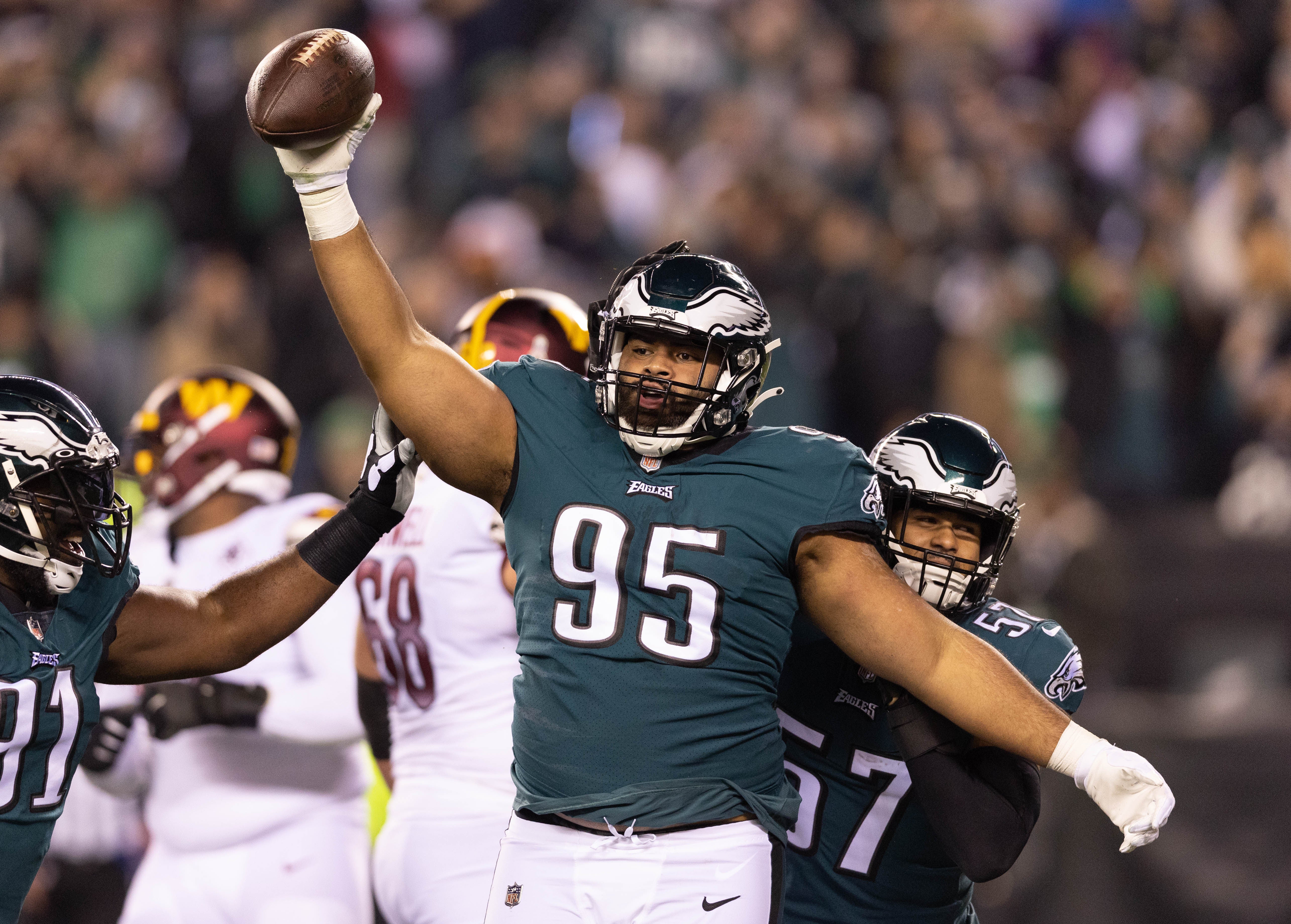 Nov 14, 2022; Philadelphia, Pennsylvania, USA; Philadelphia Eagles defensive tackle Marlon Tuipulotu (95) reacts after a fumble recovery against the Washington Commanders during the first quarter at Lincoln Financial Field.