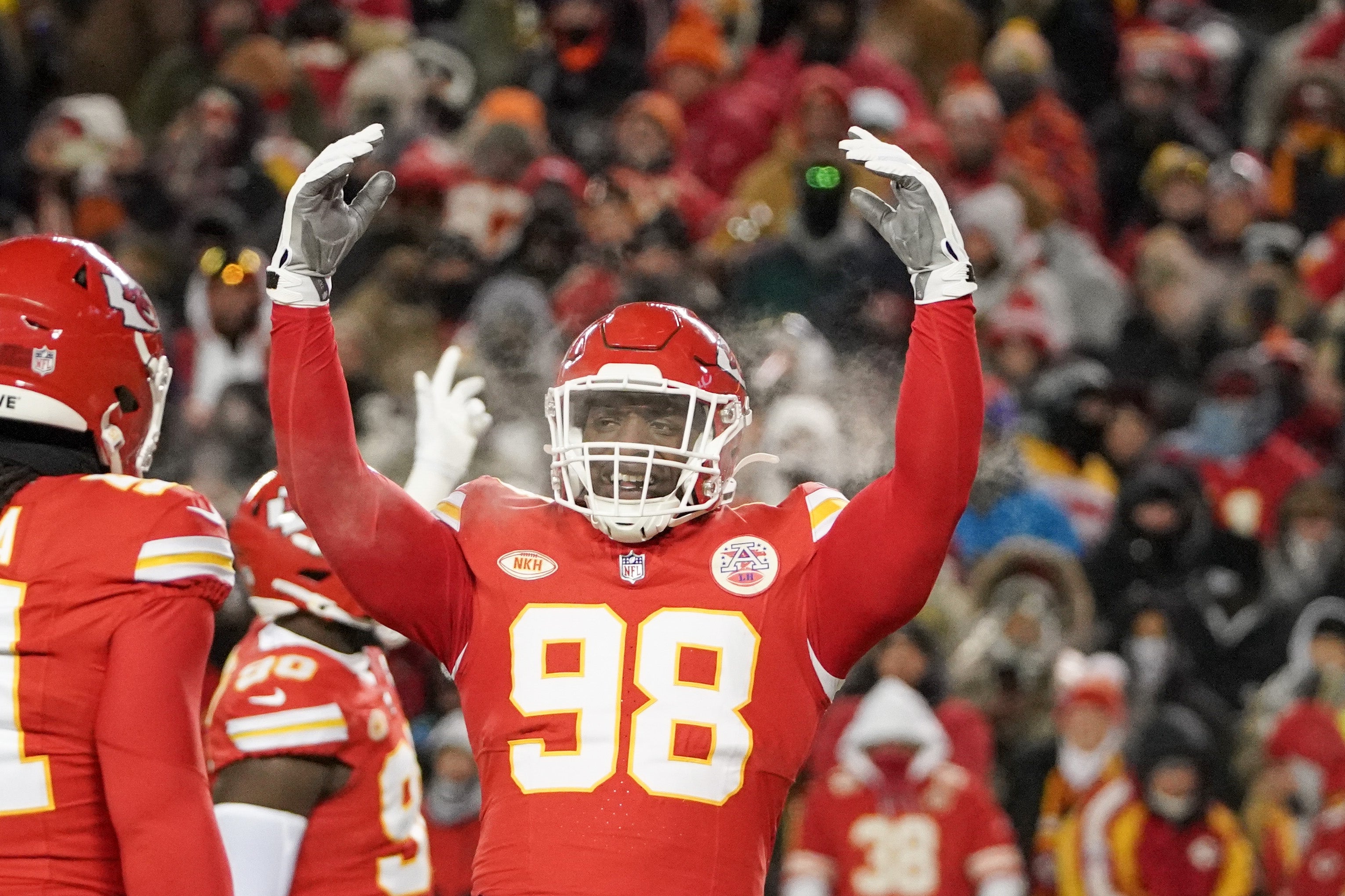 Jan 13, 2024; Kansas City, Missouri, USA; Kansas City Chiefs defensive tackle Tershawn Wharton (98) celebrates toward fans against the Miami Dolphins in a 2024 AFC wild card game at GEHA Field at Arrowhead Stadium.
