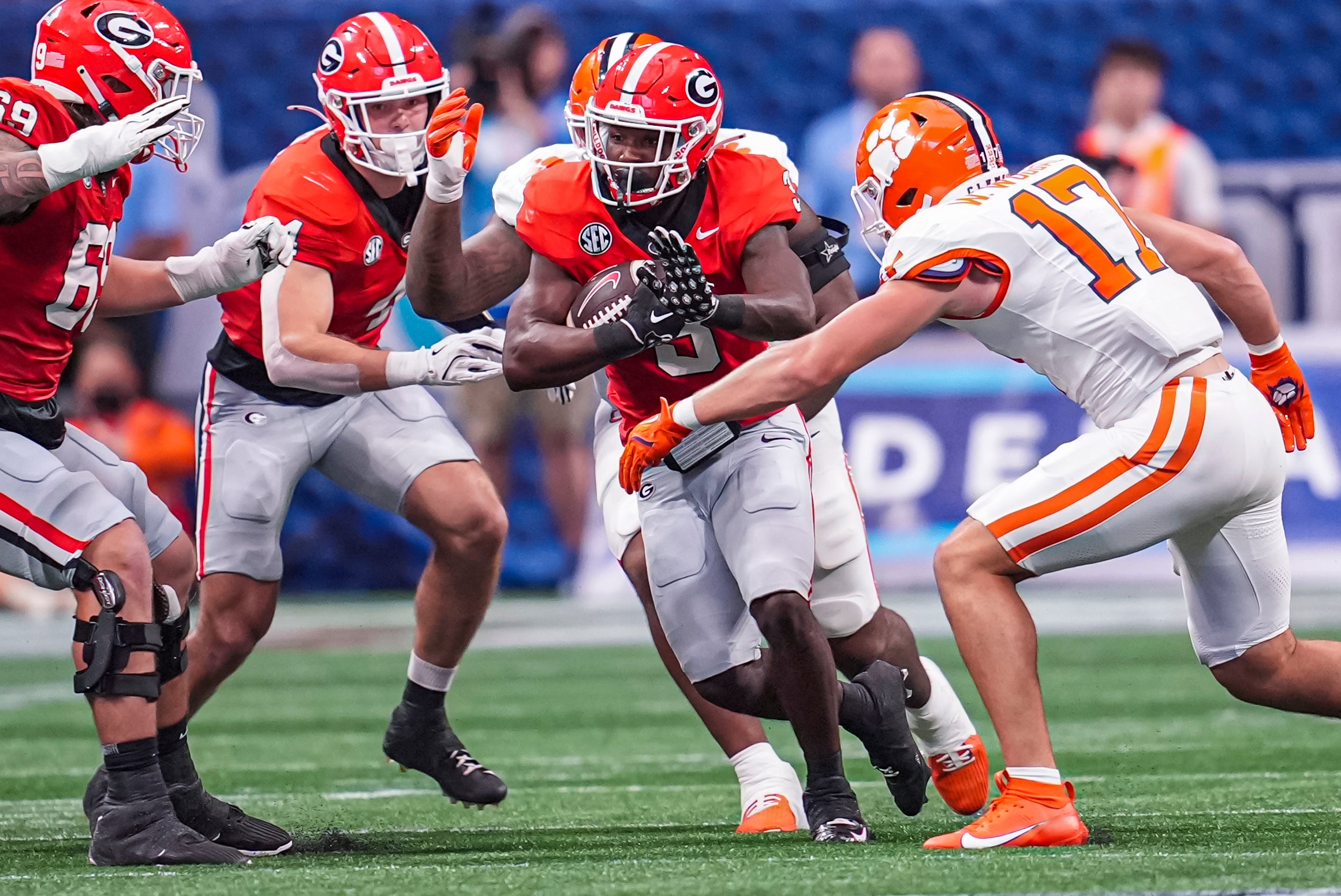 Georgia Bulldogs running back Nate Frazier (3) runs against the Clemson Tigers during the first half at Mercedes-Benz Stadium.