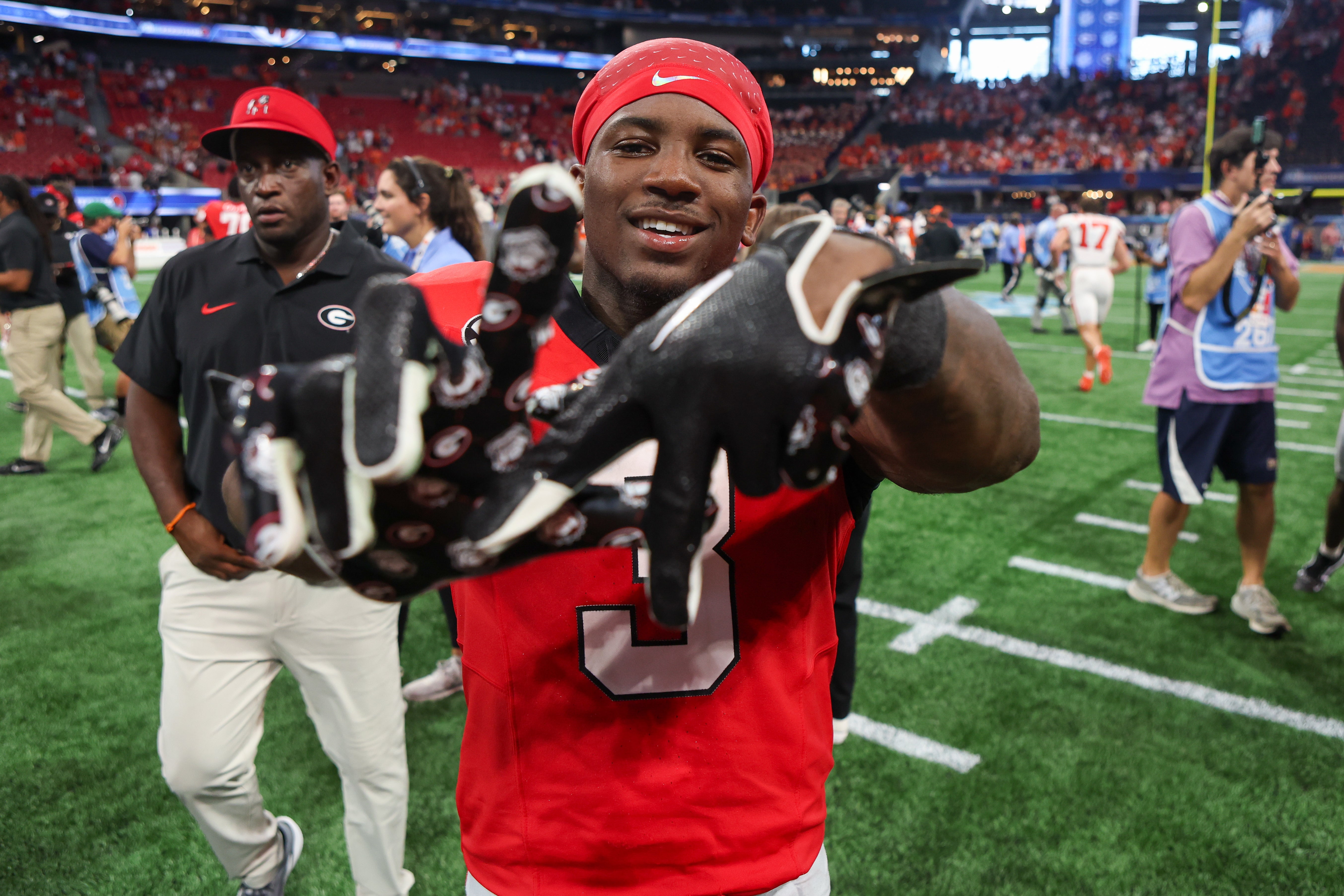 Georgia Bulldogs running back Nate Frazier (3) celebrates after a victory over the Clemson Tigers at Mercedes-Benz Stadium.