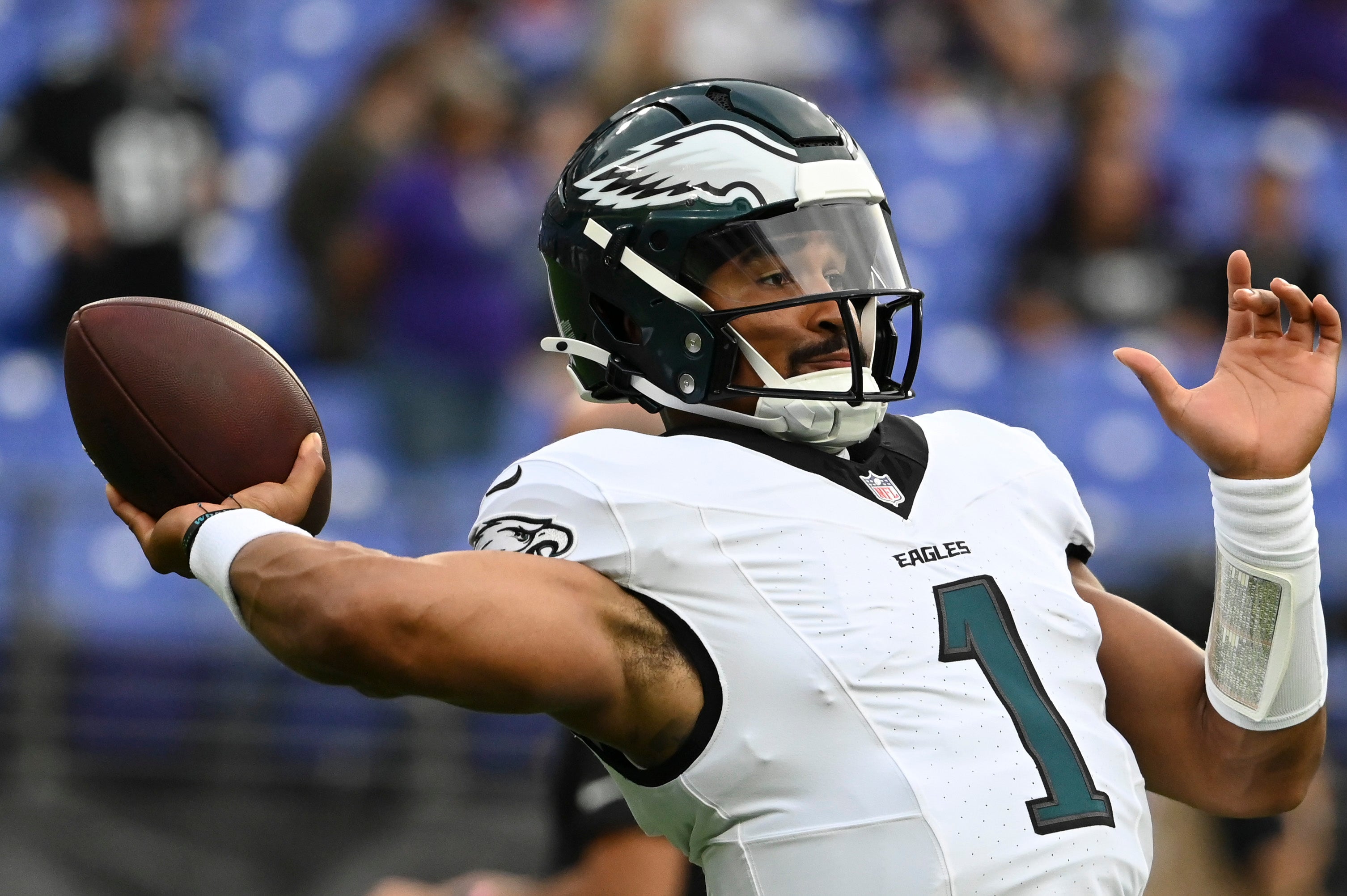 Aug 9, 2024; Baltimore, Maryland, USA; Philadelphia Eagles quarterback Jalen Hurts (1) throws before a preseason game against the Baltimore Ravens at M&T Bank Stadium.  Tommy Gilligan-USA TODAY Sports