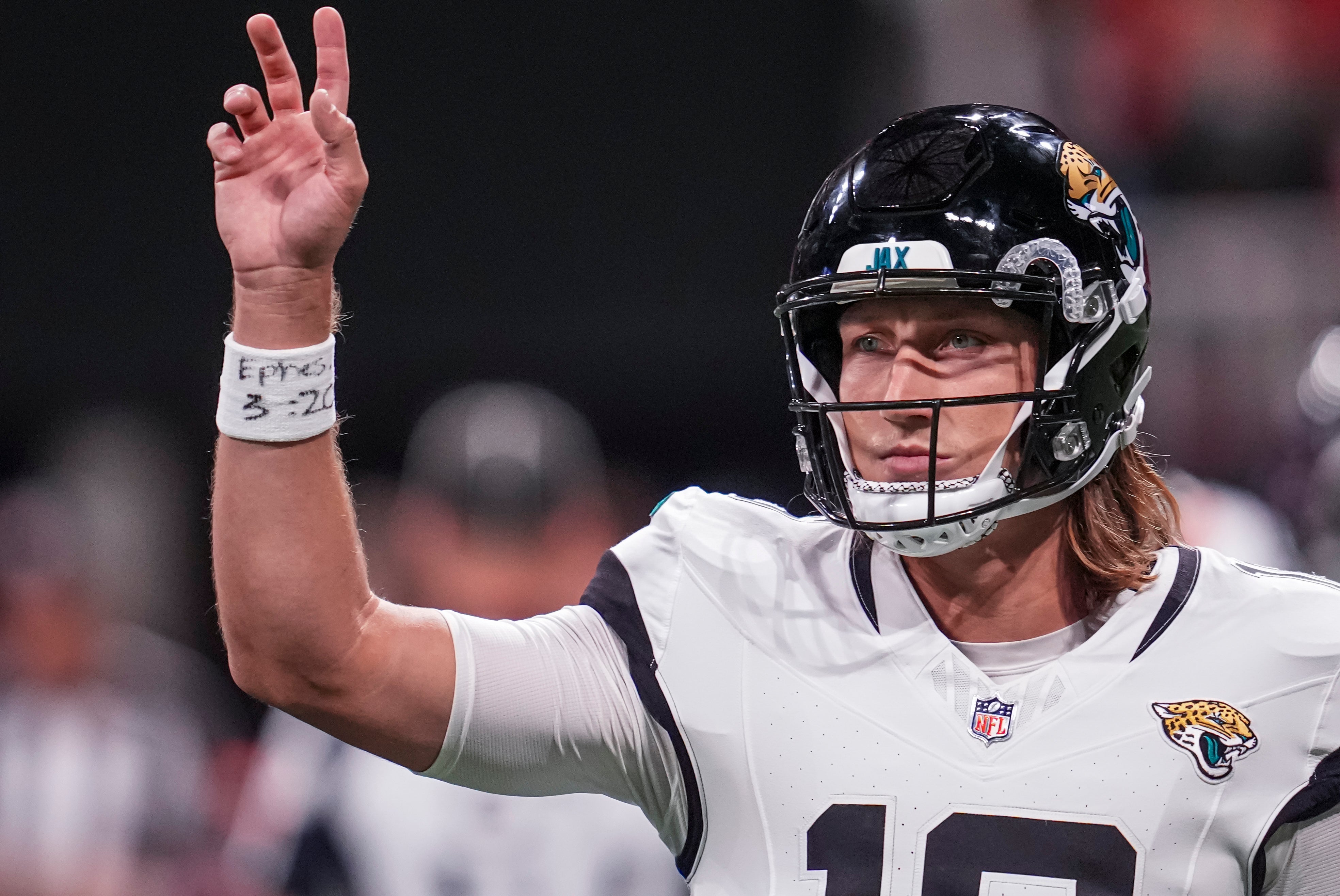 Aug 23, 2024; Atlanta, Georgia, USA; Jacksonville Jaguars quarterback Trevor Lawrence (16) gestures on the field during the game against the Atlanta Falcons during the first half at Mercedes-Benz Stadium.