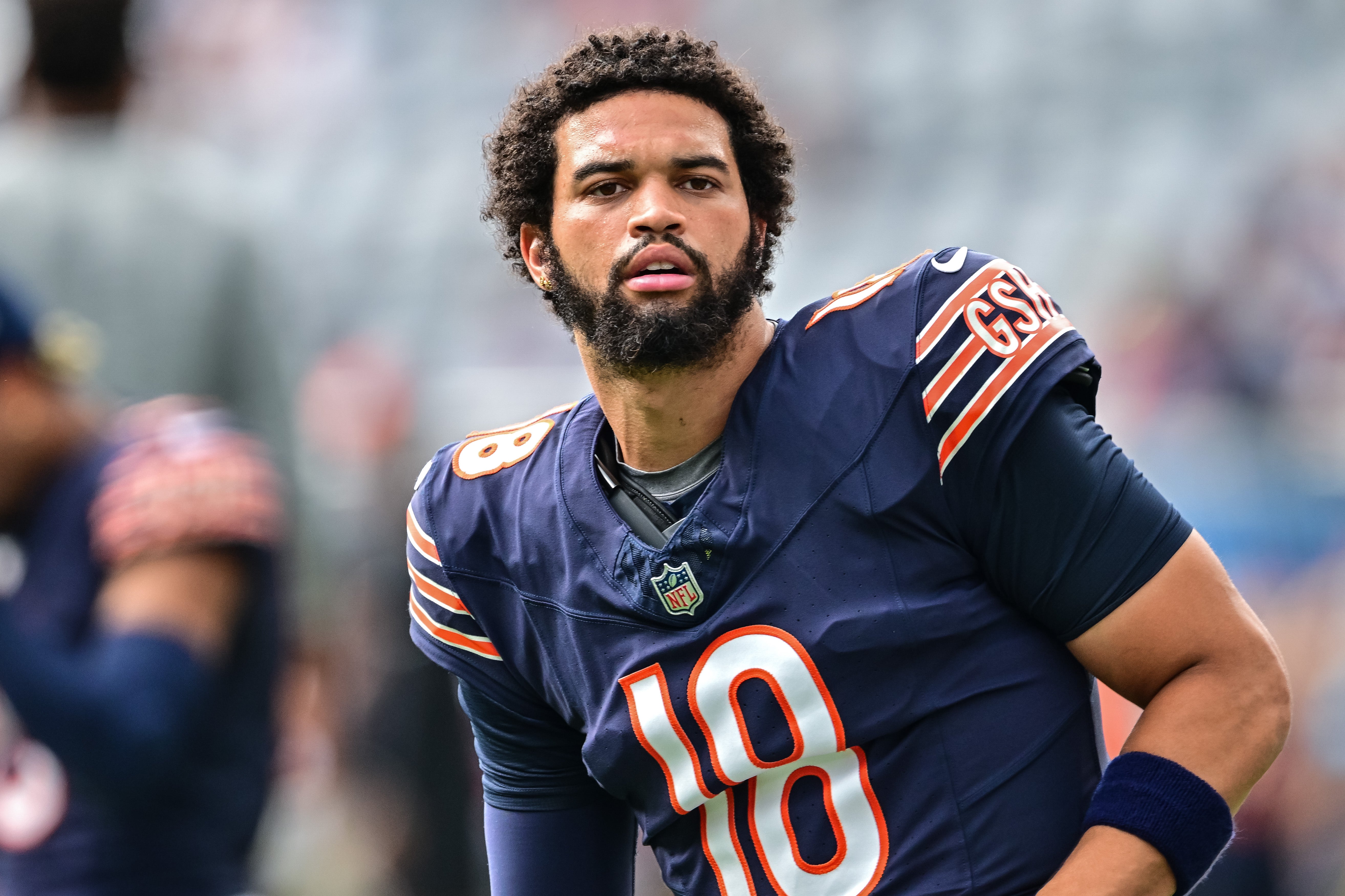 Aug 17, 2024; Chicago, Illinois, USA; Chicago Bears quarterback Caleb Williams (18) warms up before the game against the Cincinnati Bengals at Soldier Field.