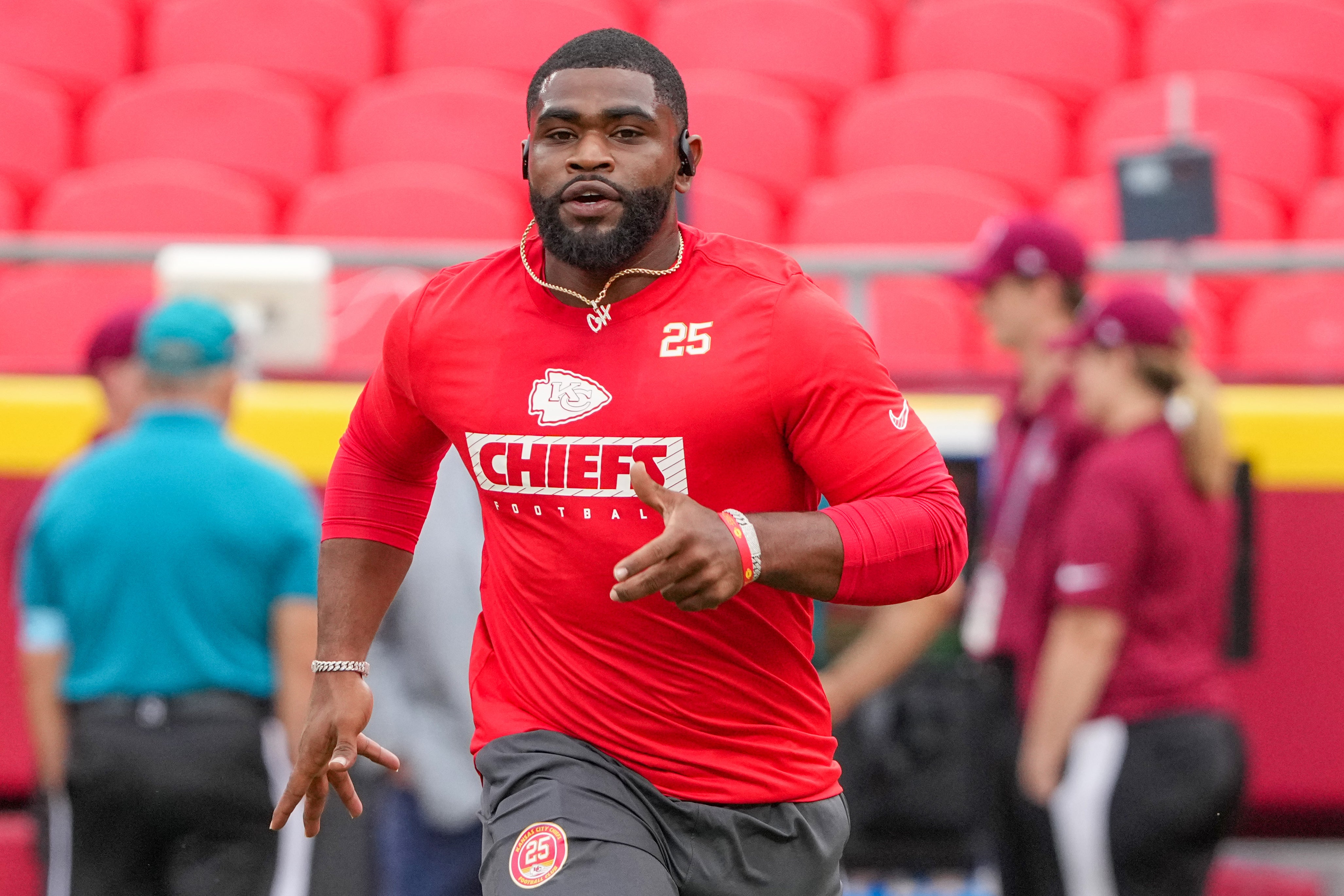 Aug 22, 2024; Kansas City, Missouri, USA; Kansas City Chiefs running back Clyde Edwards-Helaire (25) warms up against the Chicago Bears prior to a game at GEHA Field at Arrowhead Stadium.